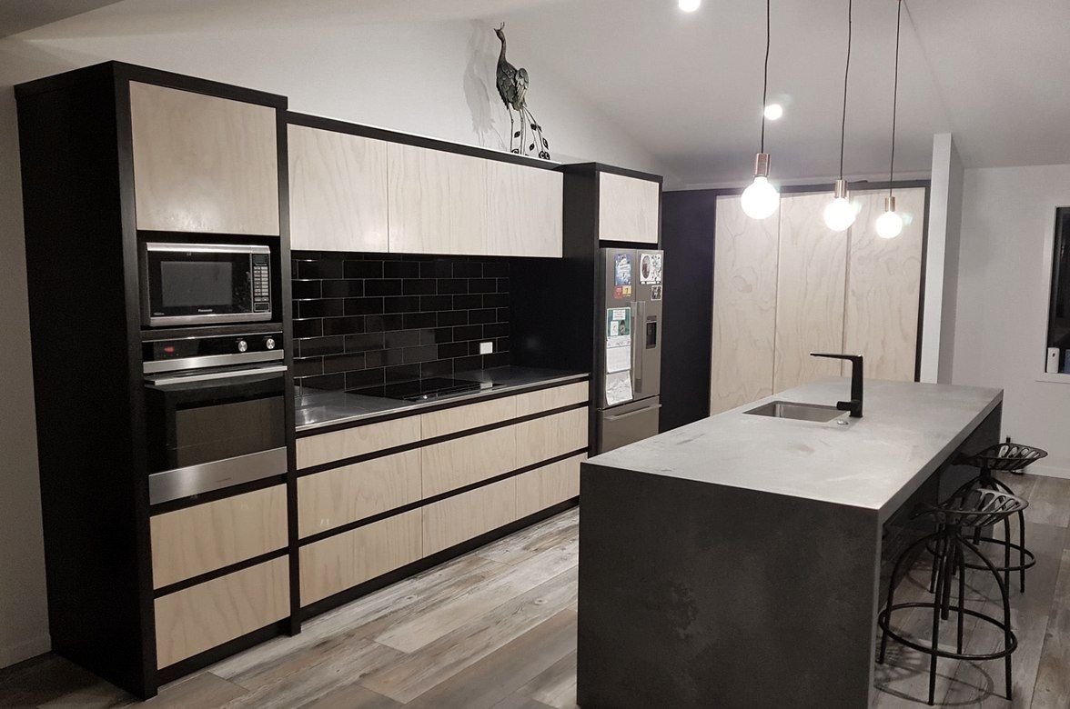 Black & Whitewashed plywood kitchen