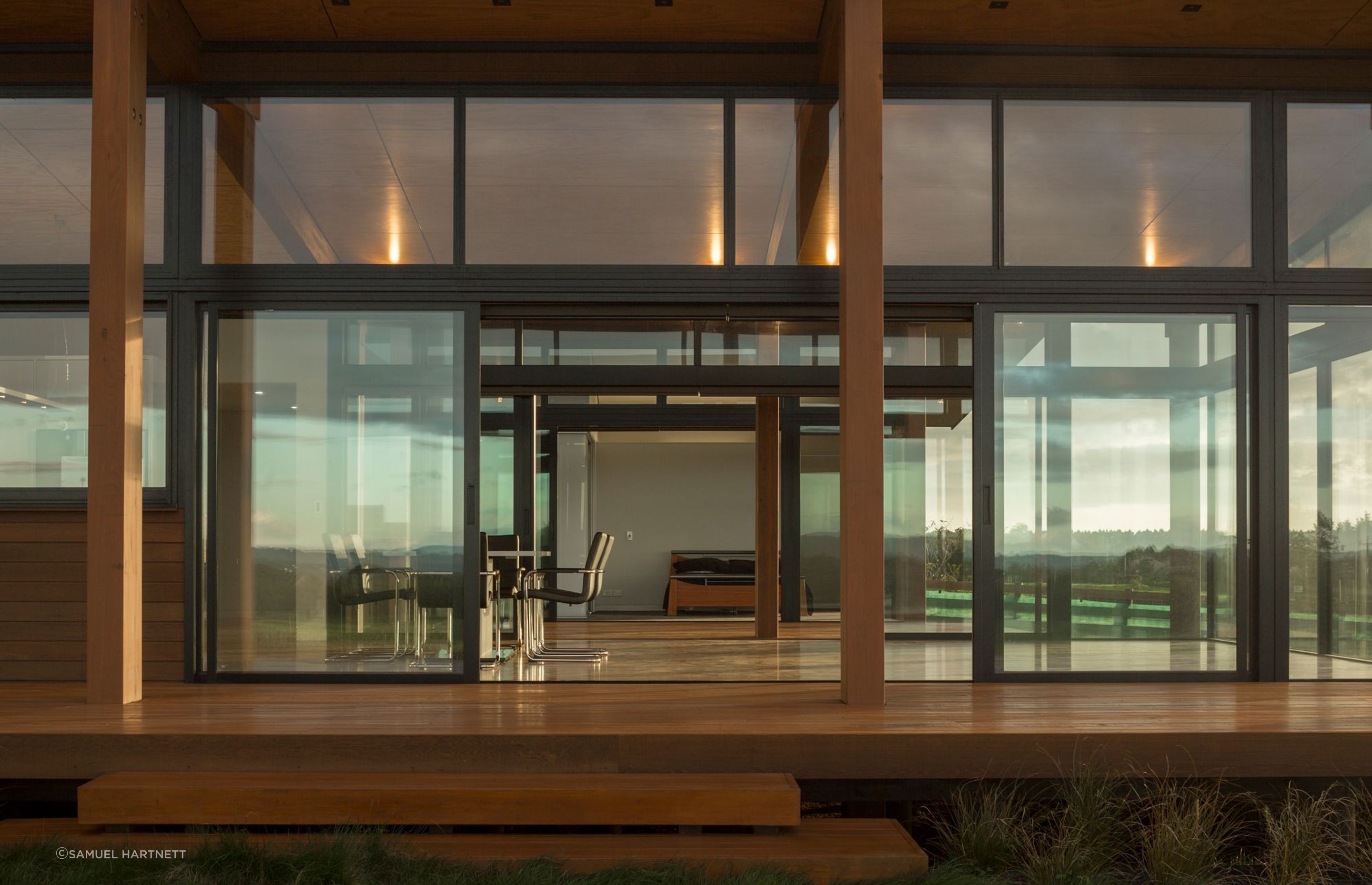 A breezeway separates two pavilions containing open plan living space from the secluded bedroom and bathroom wing.