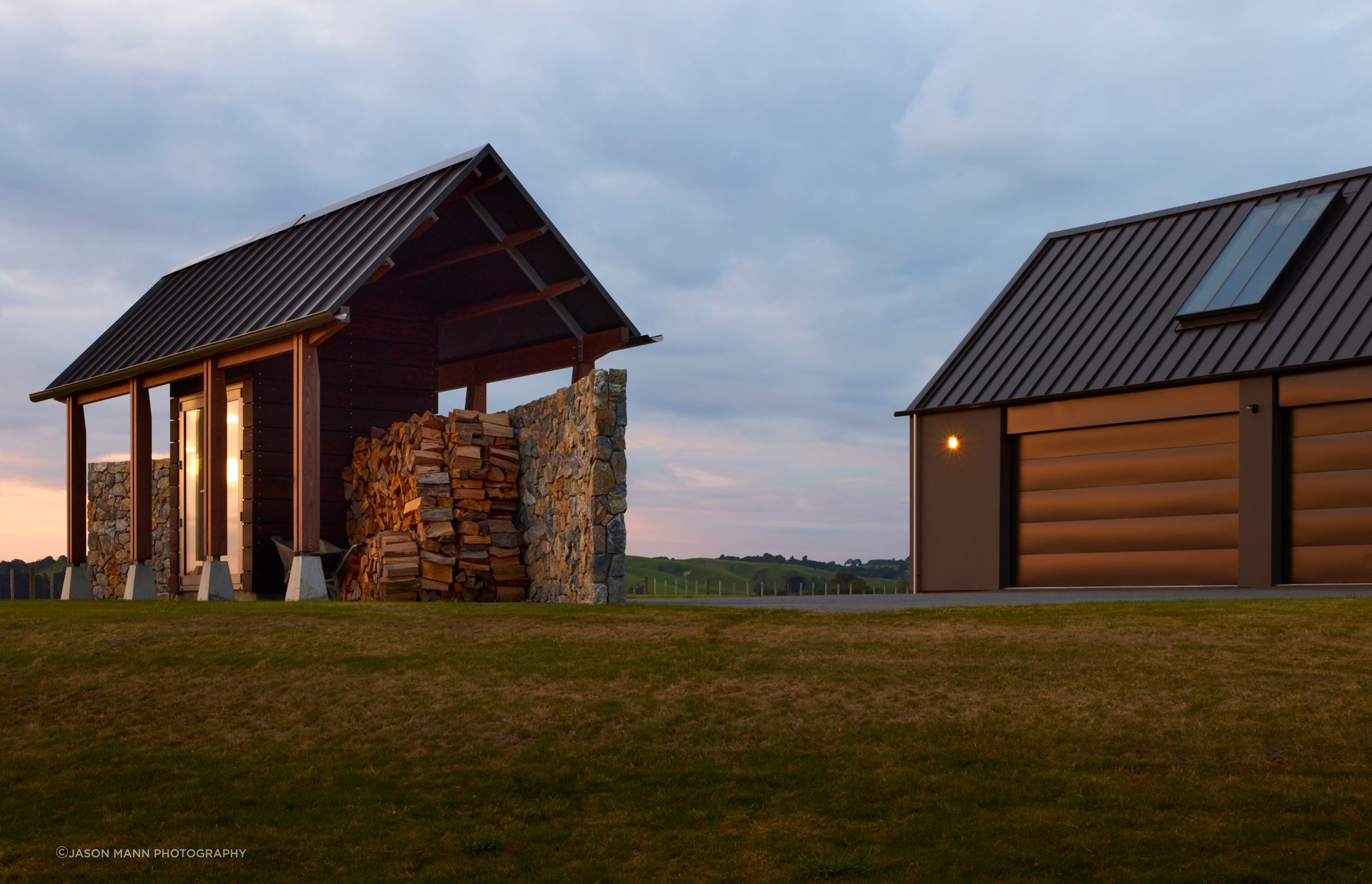 The woodshed doubles as a visual break, so that the utility sheds on the farm can't be seen from the living spaces.