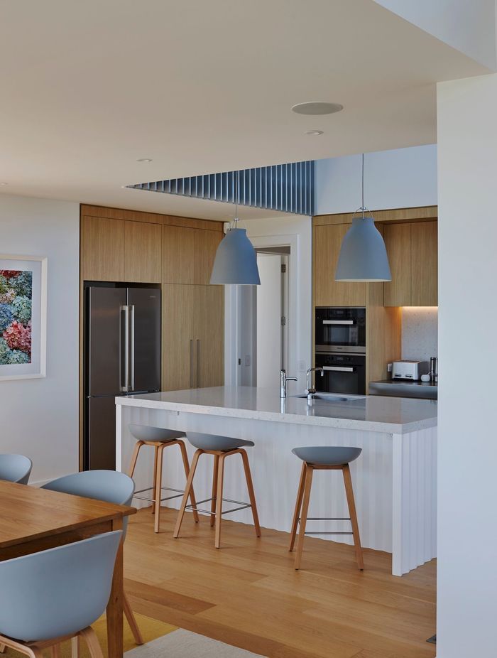 “There's quite a beautiful detail under the island bench where it has a folded origami base. We were really pleased with how they turned out. It has a little bit of crispness and a little bit of elegance to it but without being too full on,” says Kate.