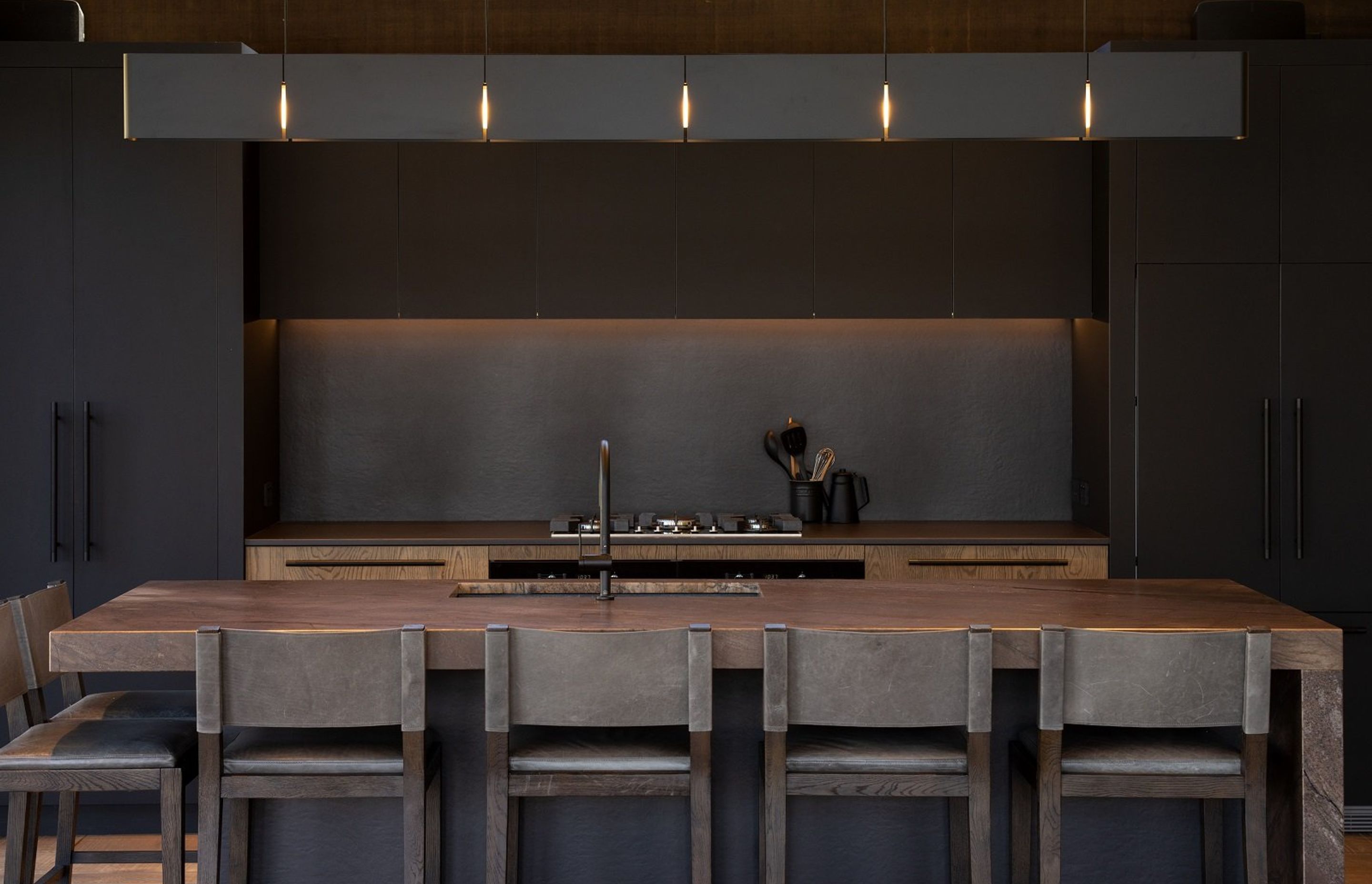 The dark palette was chosen for the kitchen, to give it an earthy and solid 'lodge' feel.