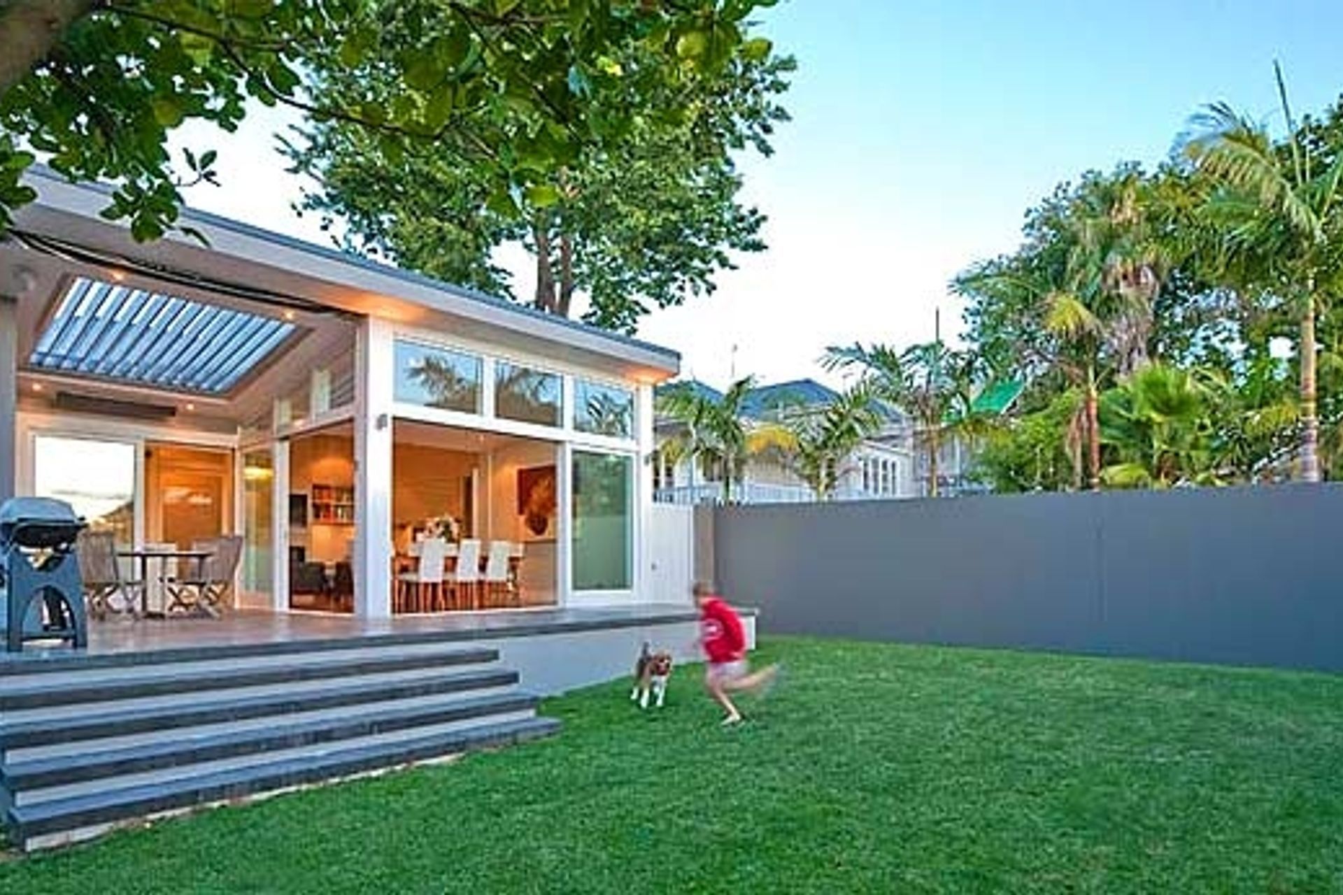 Central Auckland Villa has a modern rear extension which opens up to the back yard, by Salmond Reed Architects B