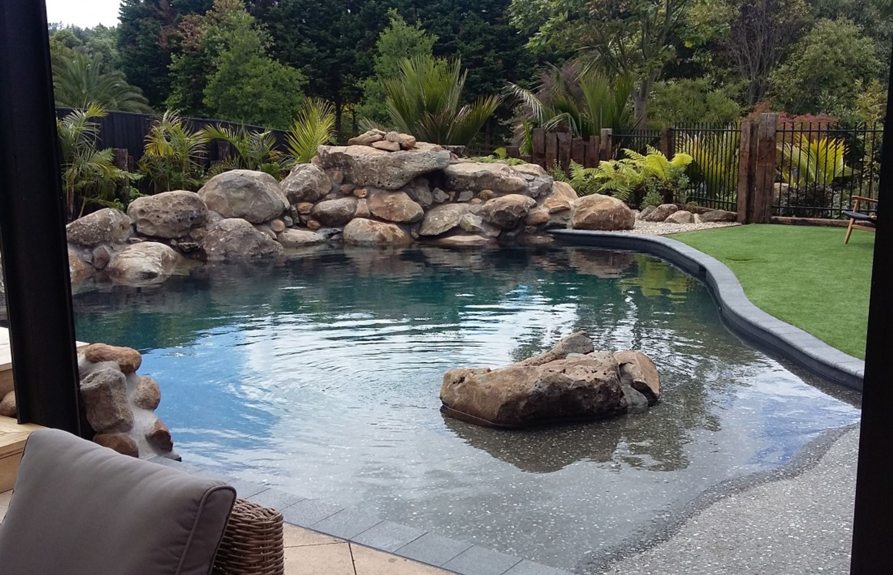 Create your own personal back yard oasis with a rock pool