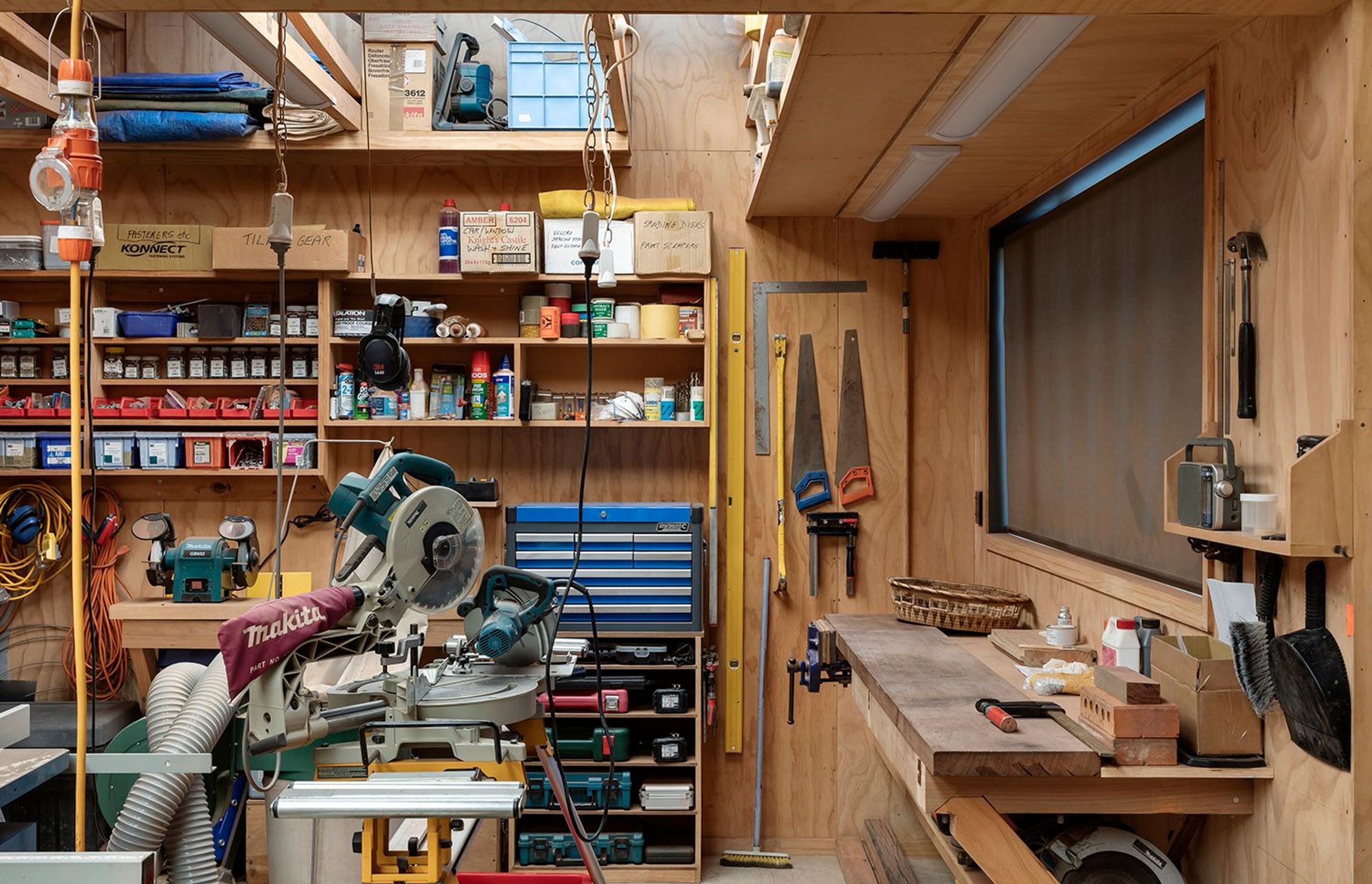The house needed to incorporate the clients' passions and this was realised in a full woodwork workshop as well as a separate sewing room.