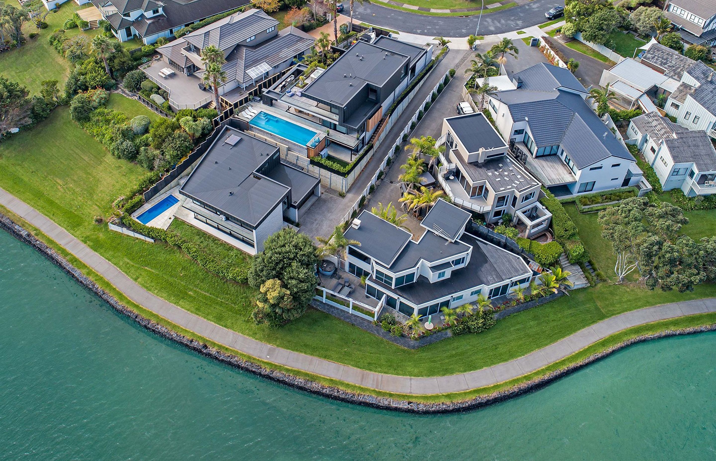 An aerial view of Island Life in the Suburbs nestled behind its sister home, Farm Cove I, which was built and sold to fund the former.