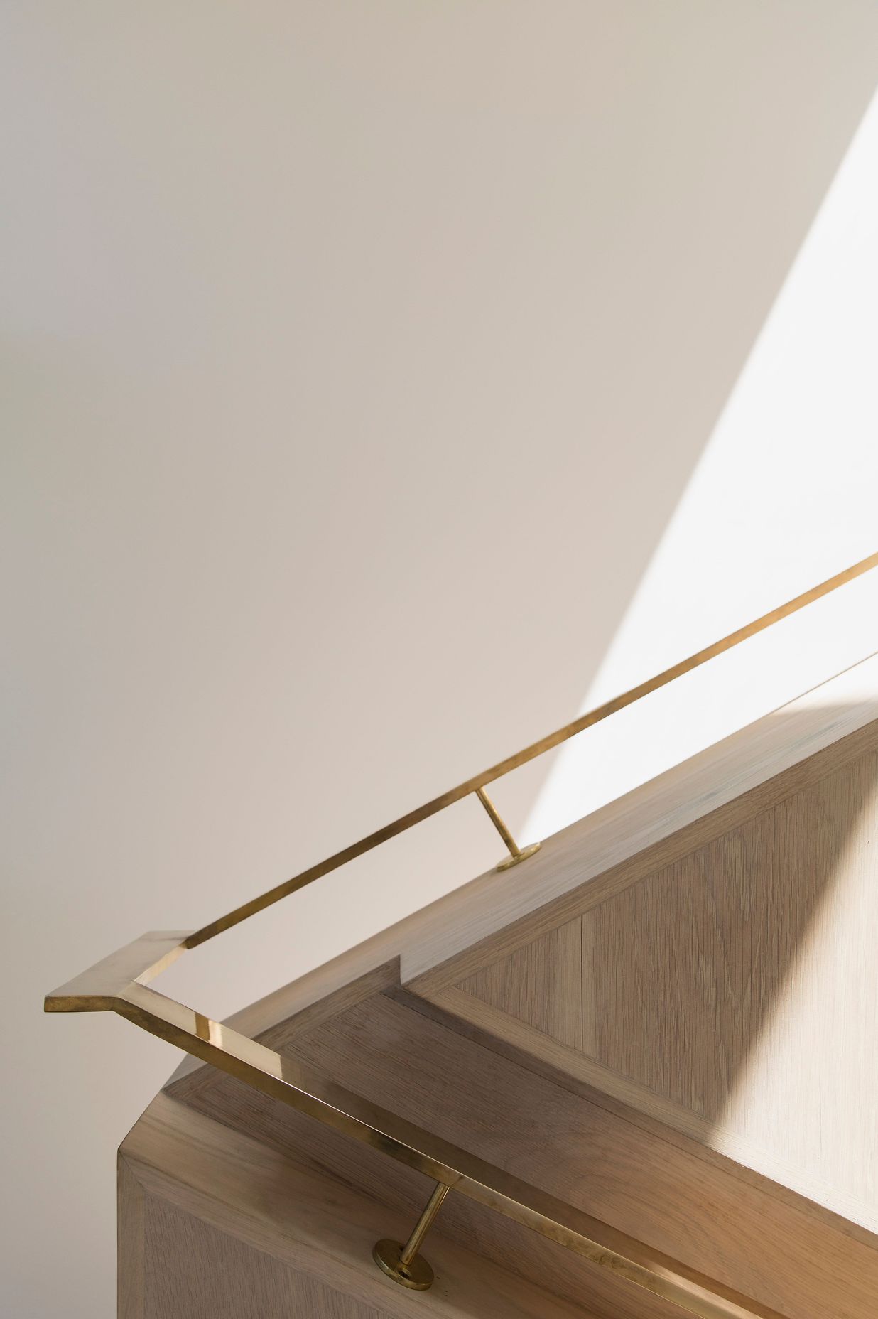  A detail shot of the brass bannister on the timber staircase.