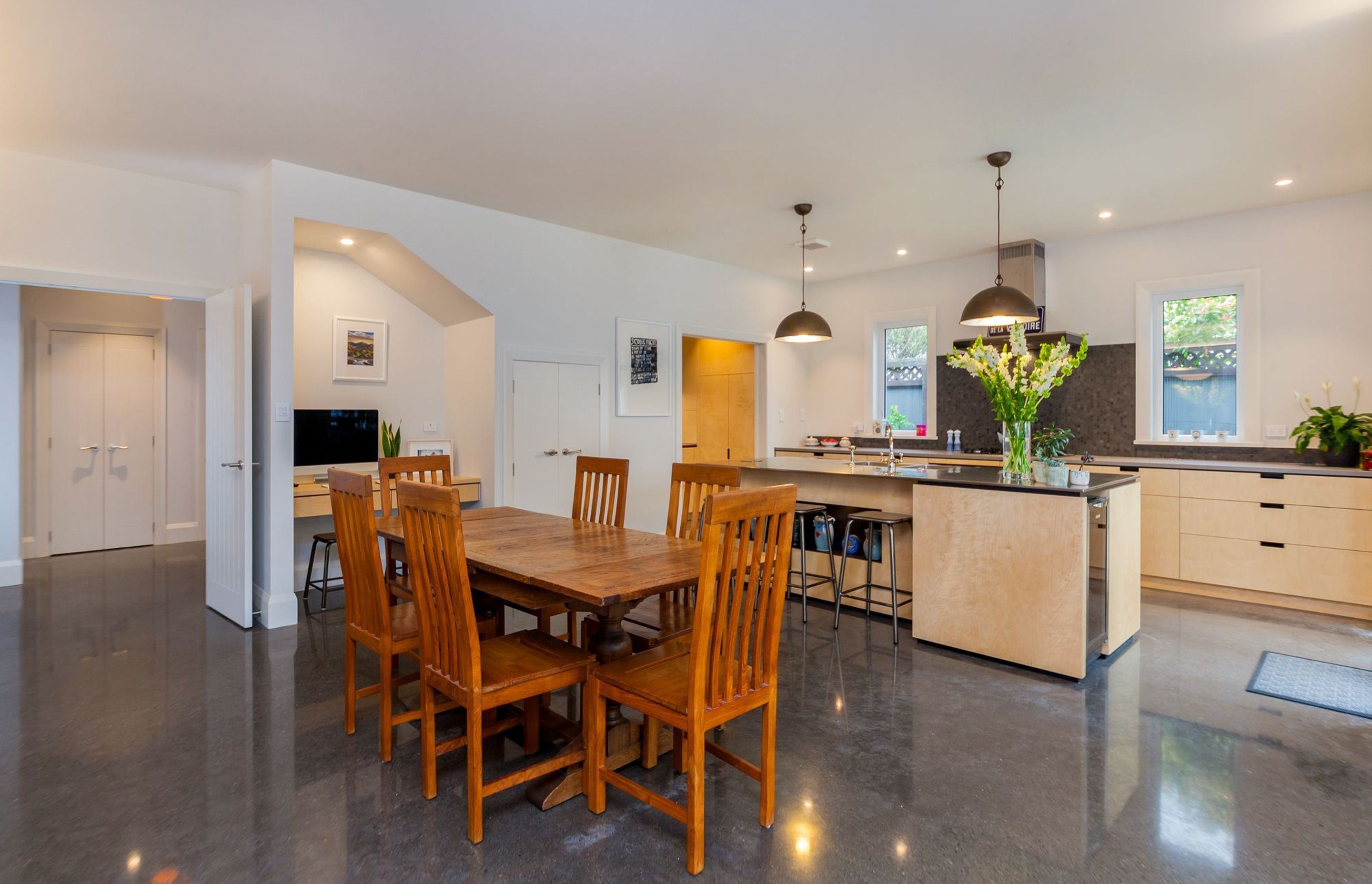 Polished concrete floors in the kitchen and dining.