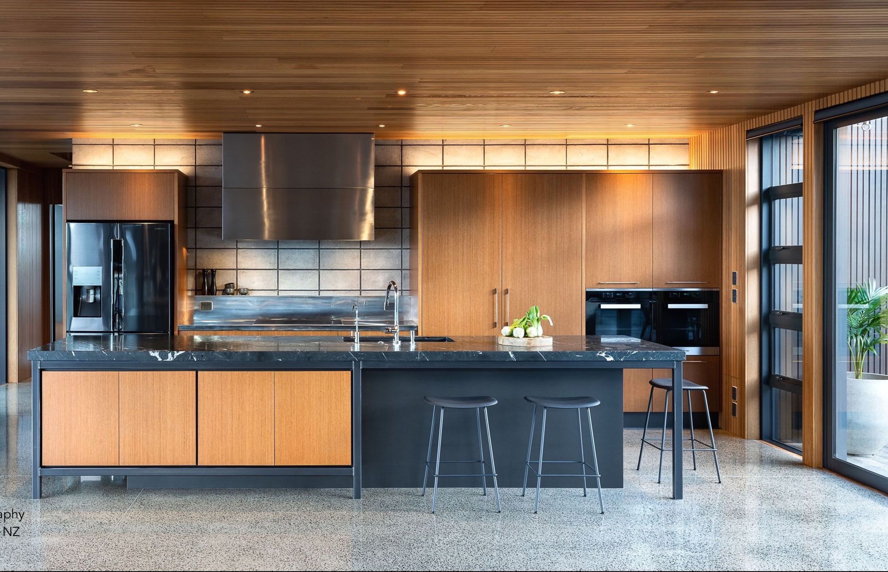 Keen to celebrate their new home’s industrial and natural materiality, our clients wanted a contemporary kitchen, designed with rawness &amp; ‘honesty’. A concrete block wall was to feature in the kitchen yet be practical