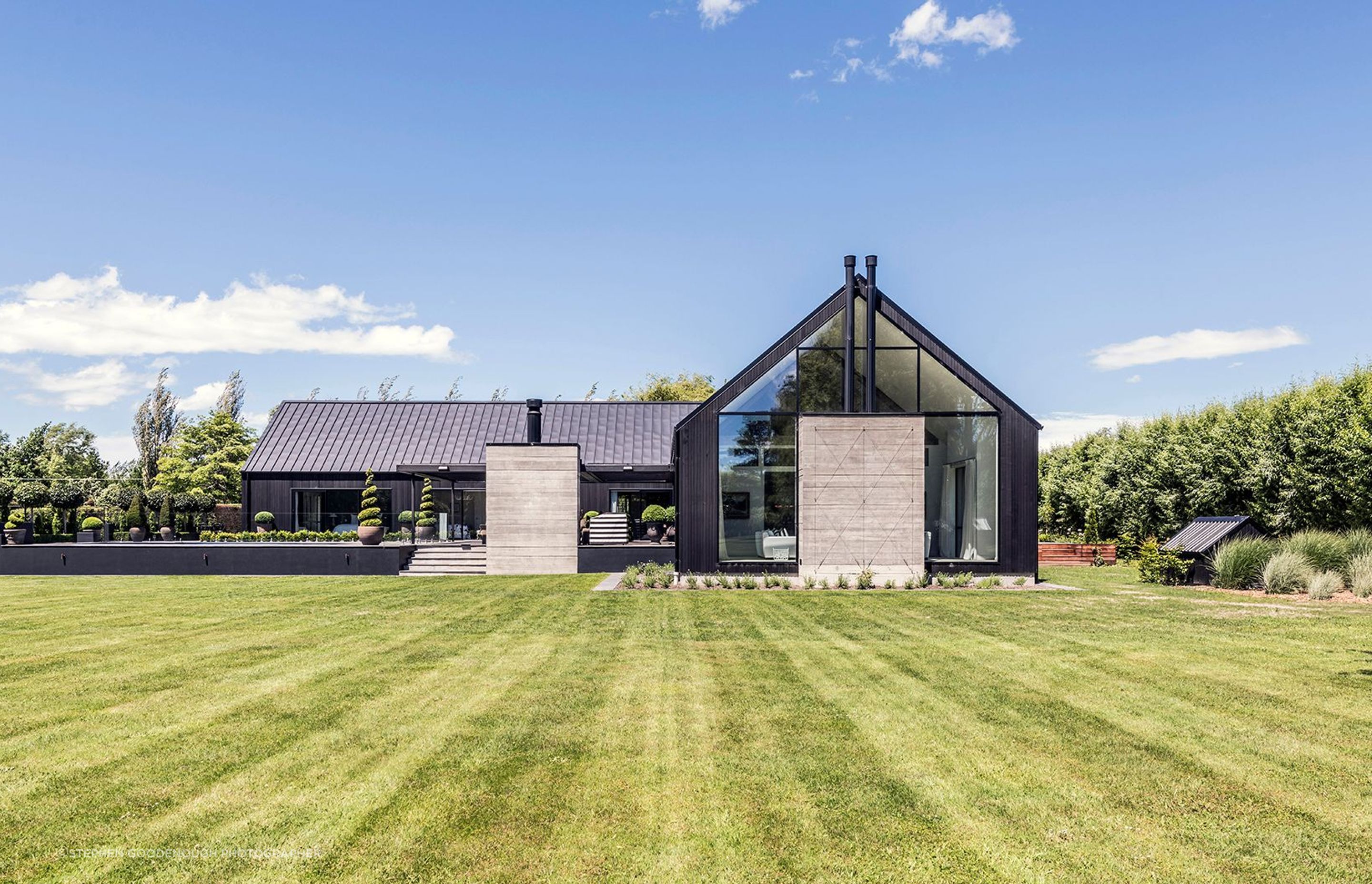 This striking home sits on a lifestyle block on the outskirts of Christchurch.