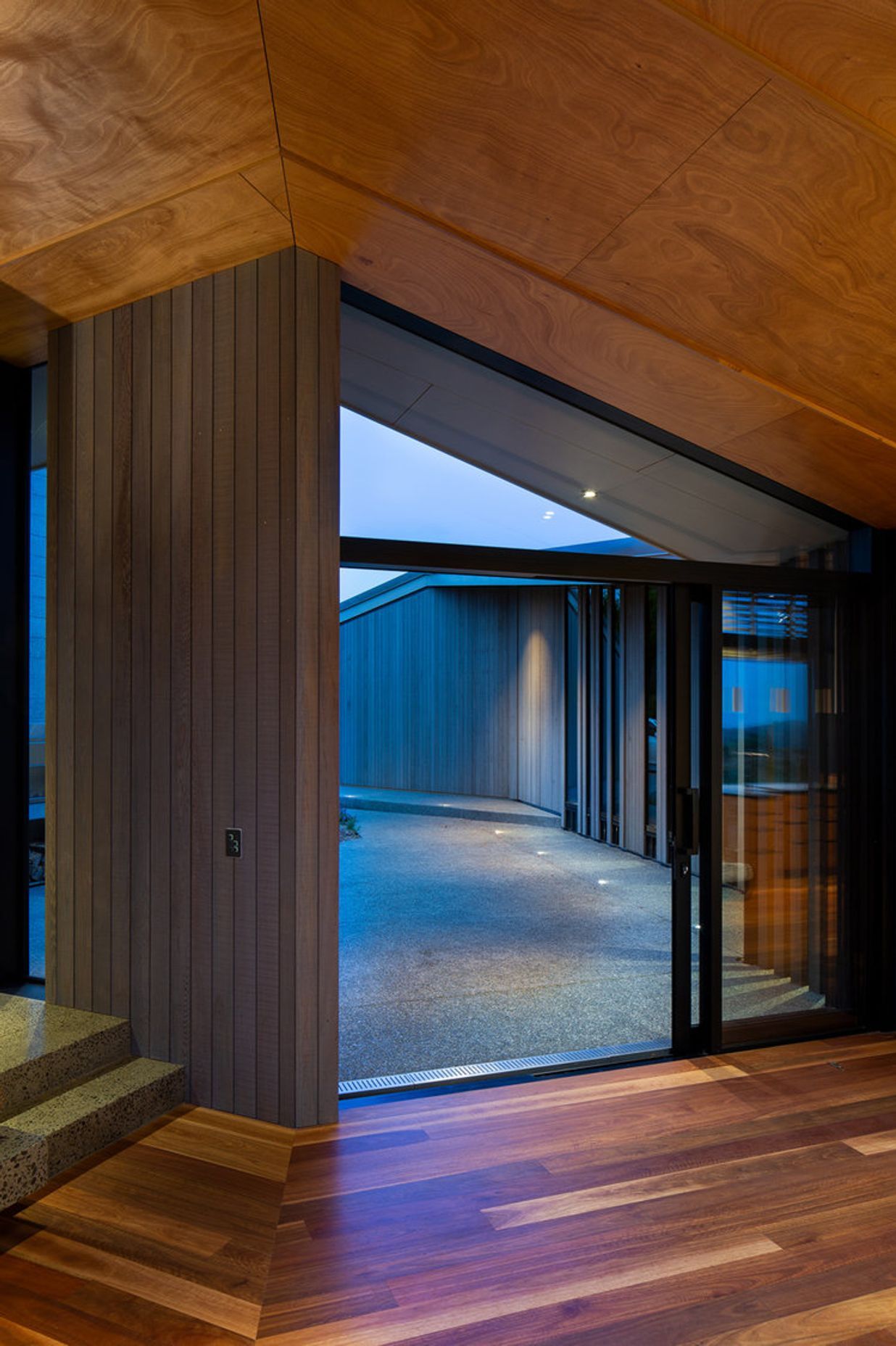 Okoume plywood ceiling and spotted gum timber flooring add warmth to the interior.