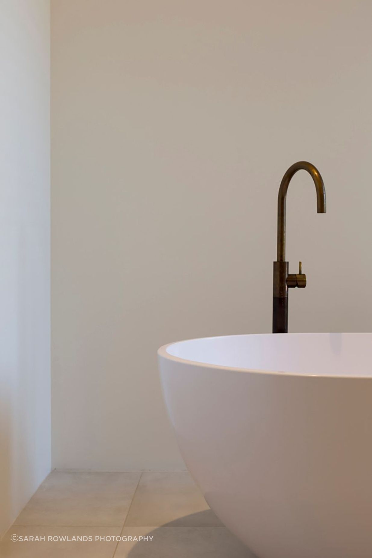 The 'Egg' freestanding bath with brass tapware from Plumline.