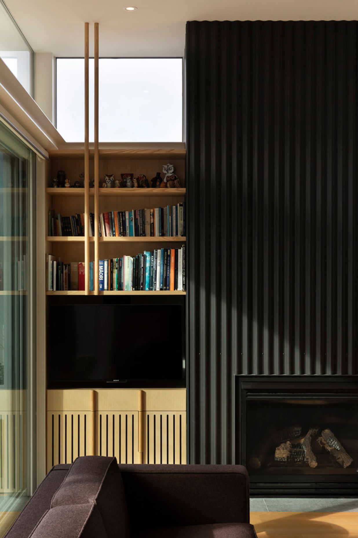 The house features bespoke American ash cabinetry designed by the architect.