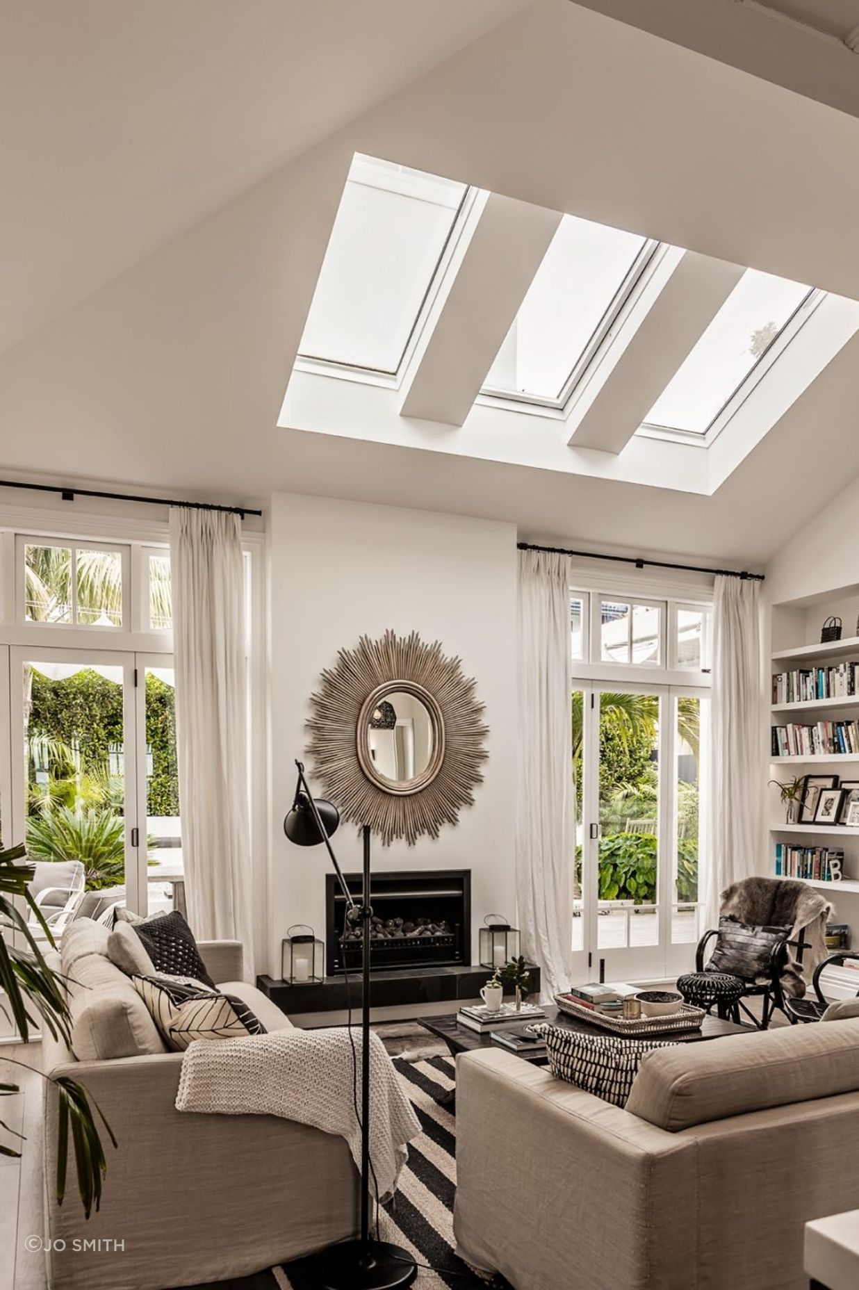 The lounge area is light and airy as a result of skylights and French doors.