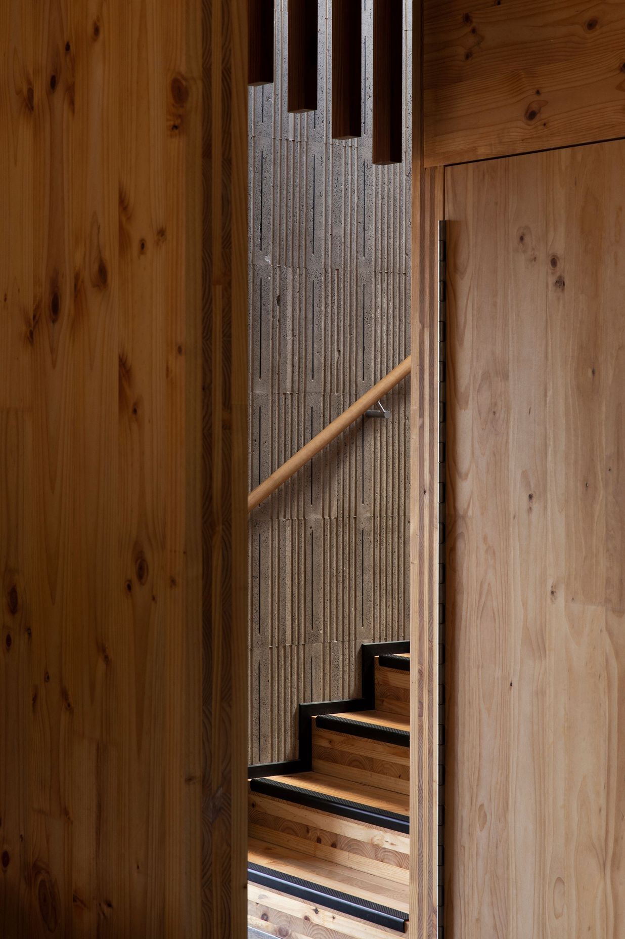 The stairwell to the upper level is constructed from insulated concrete form paneling.