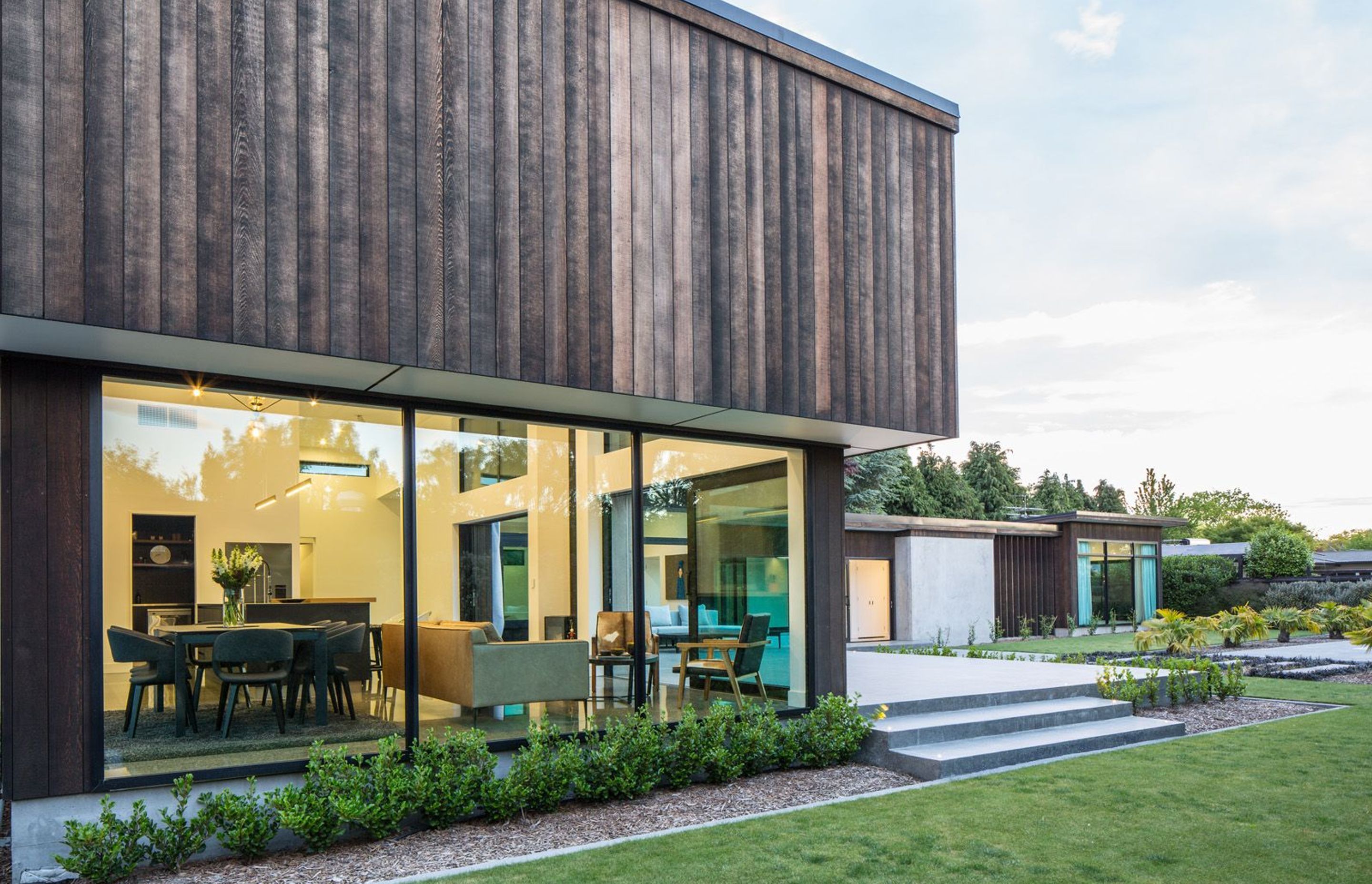 The homeowners wanted to incorporate a modern rustic feel into the exterior of the home and opted for cedar cladding with various levels of staining.
