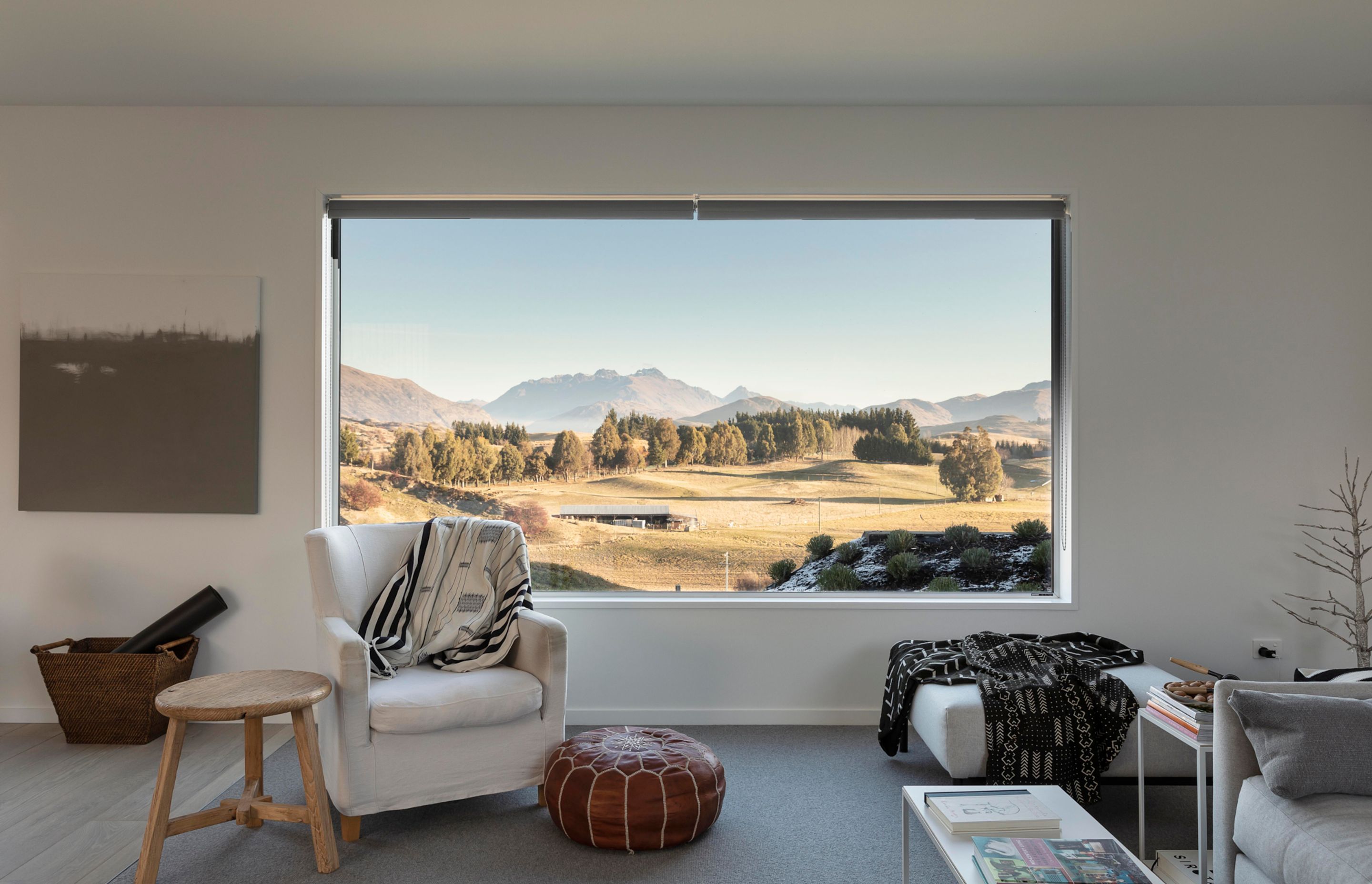 Windows are placed as artfully as paintings throughout the home and capture stunning picturesque views.
