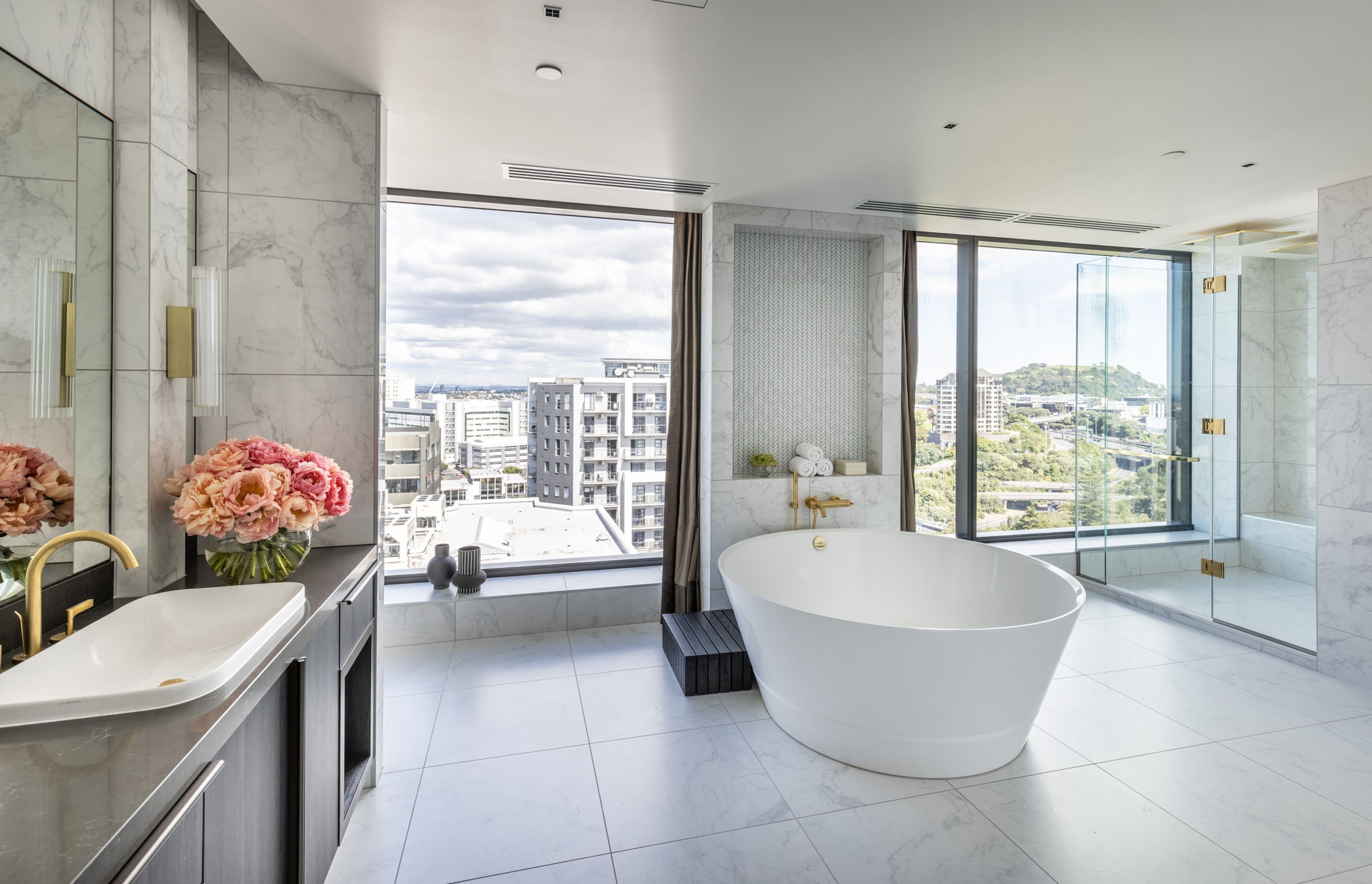 The Chairman suite features an opulent freestanding bath in an oversize bathroom.