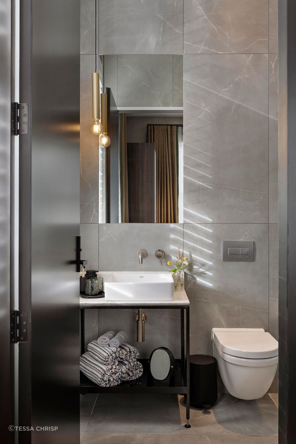 Because of the very limited timeframe quick solutions were key; the existing free floating large basins were replaced with a new vanity unit and smaller basins, using the same plumbing outlets for toiletries.