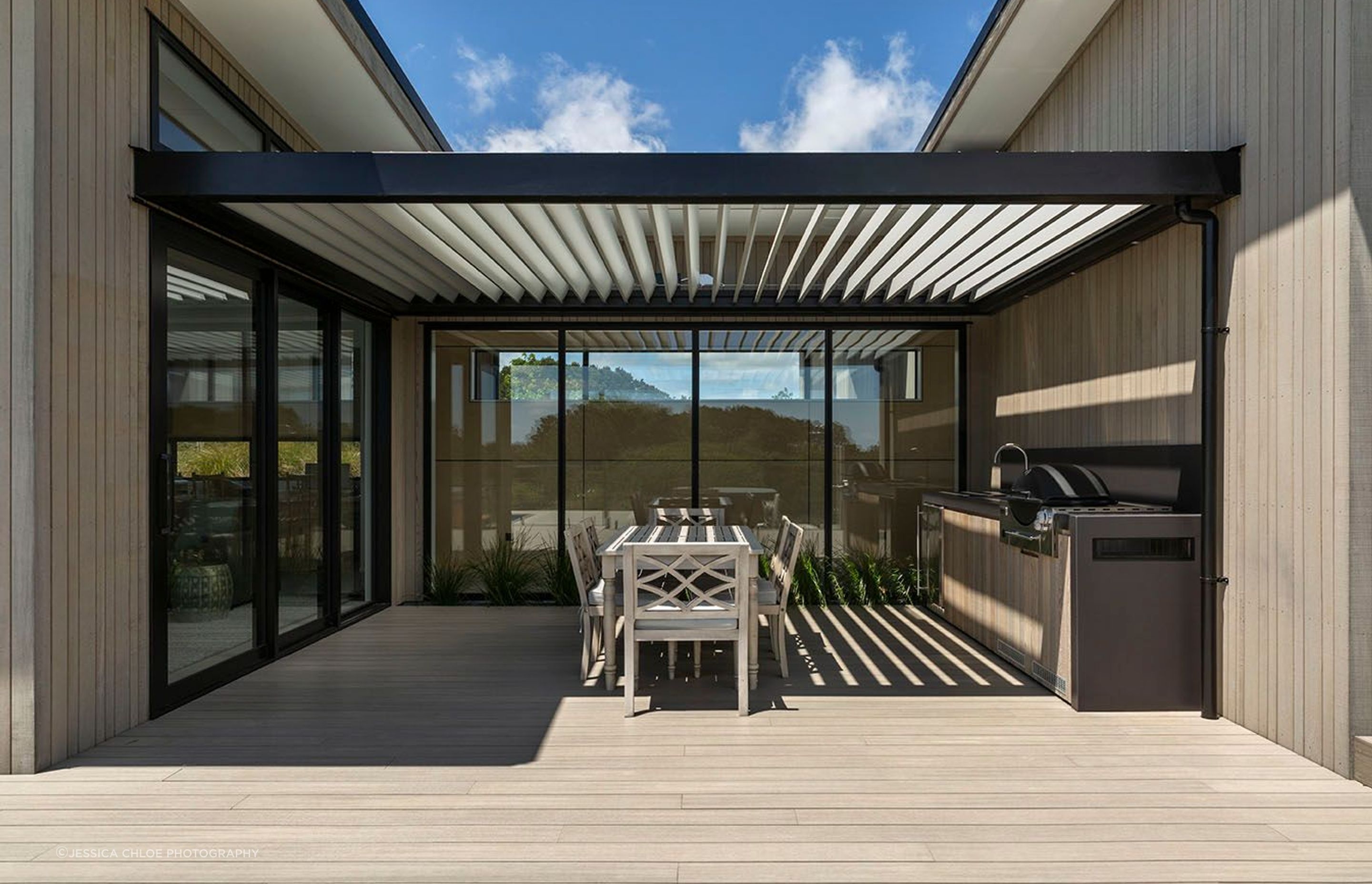 This fabulous outdoor kitchen and barbecue area is the prefect sheltered spot for summer entertaining.