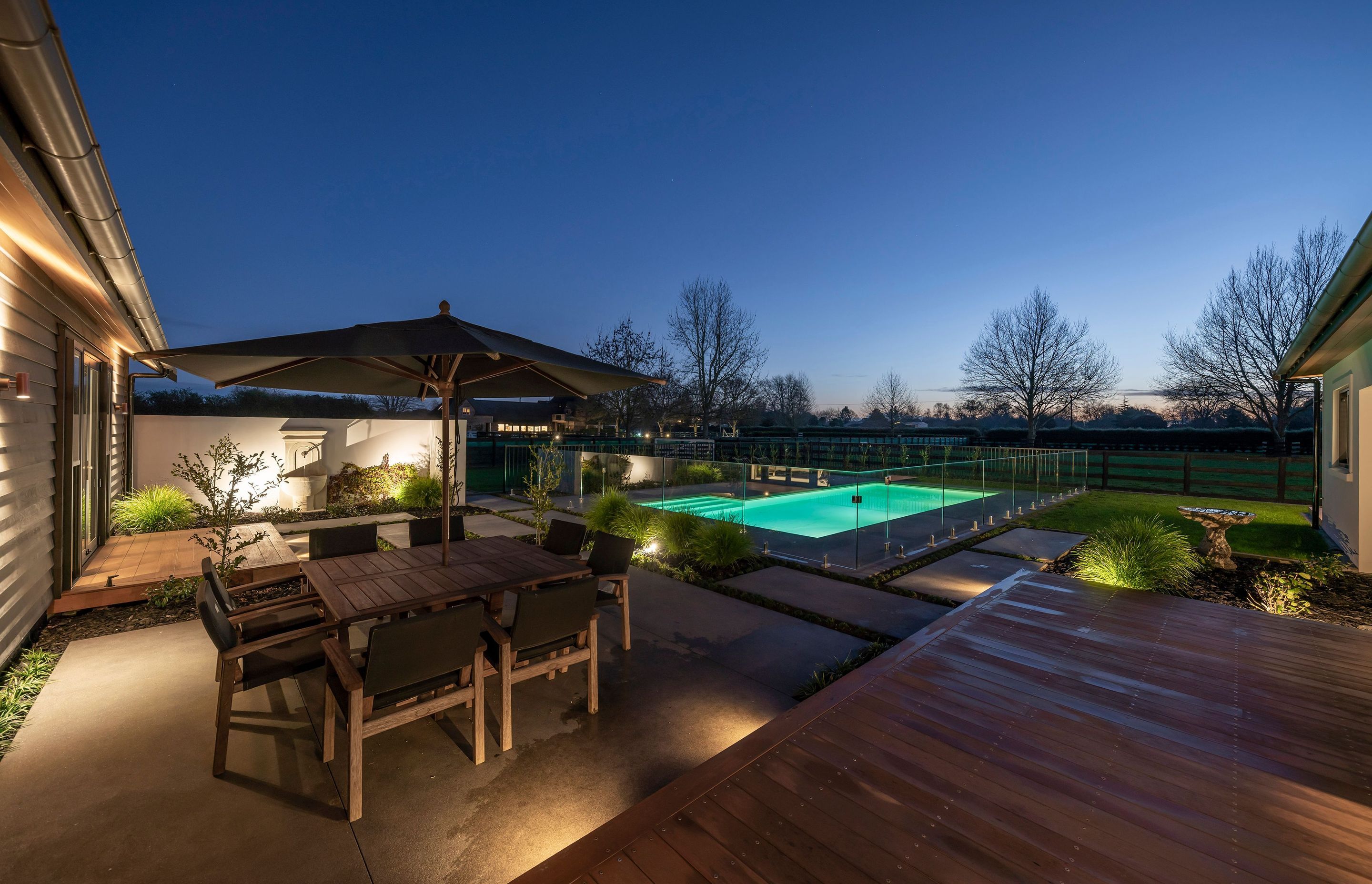 Outdoor entertaining is a cinch, with multiple egress points leading onto decks and terraces, as well as the pool.