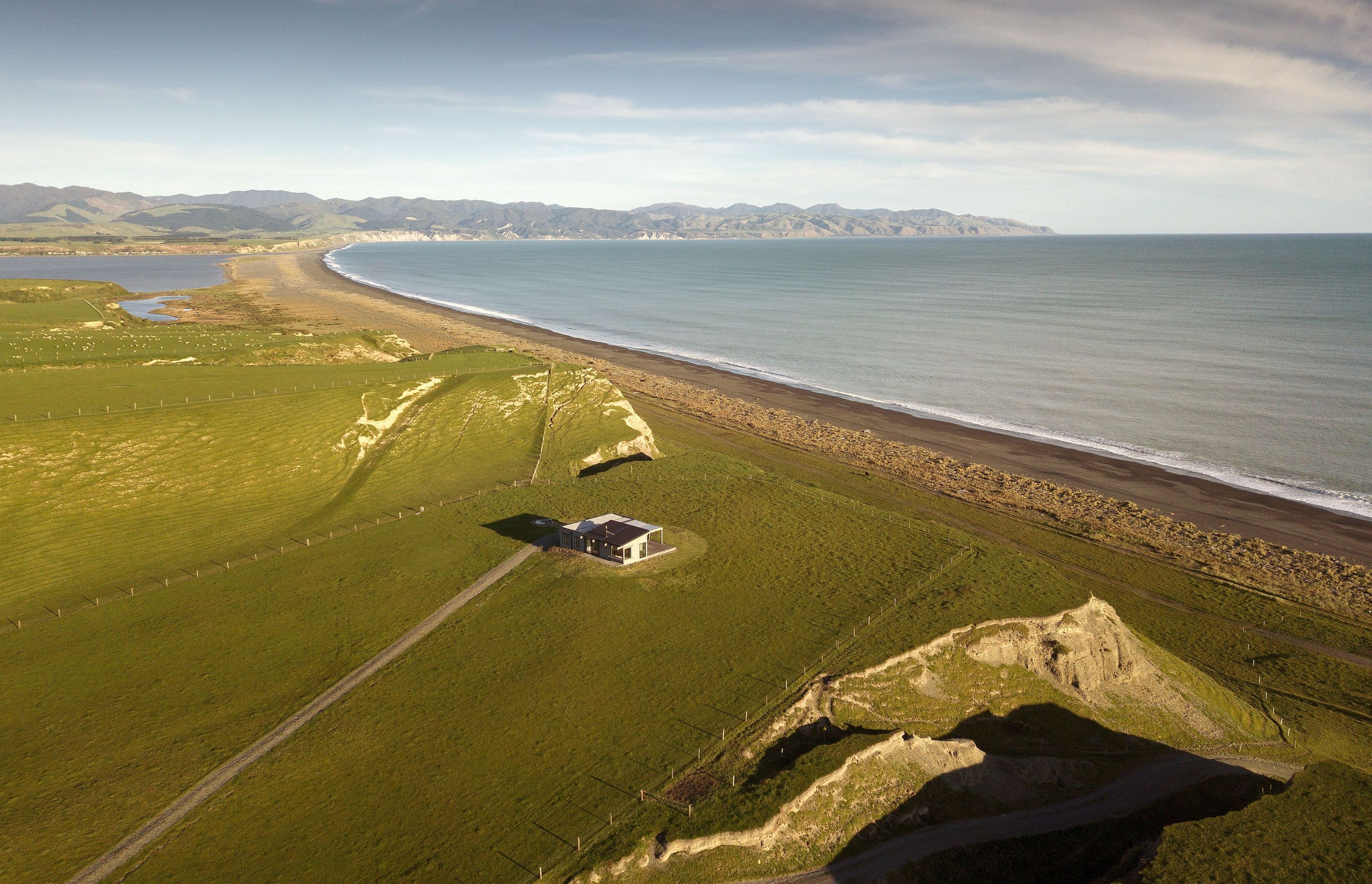 The owners of this Wairarapa farm wanted a place to retreat to so they could enjoy the solitude this remote and exposed site afforded.