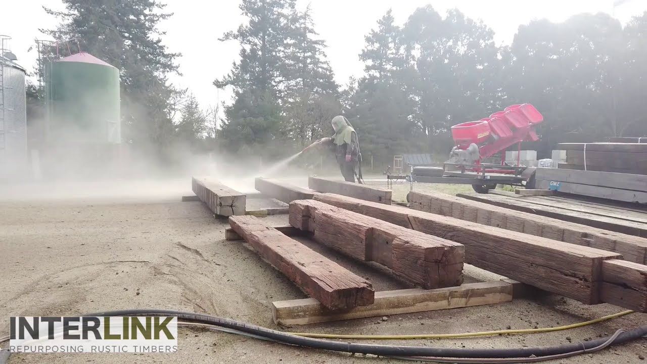 Sandblasting hardwood beams