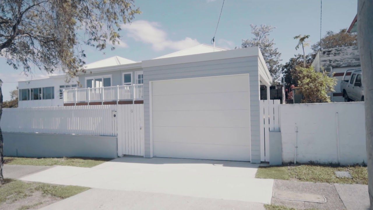 Flatline Sectional Garage Door in Colorbond Surfmist