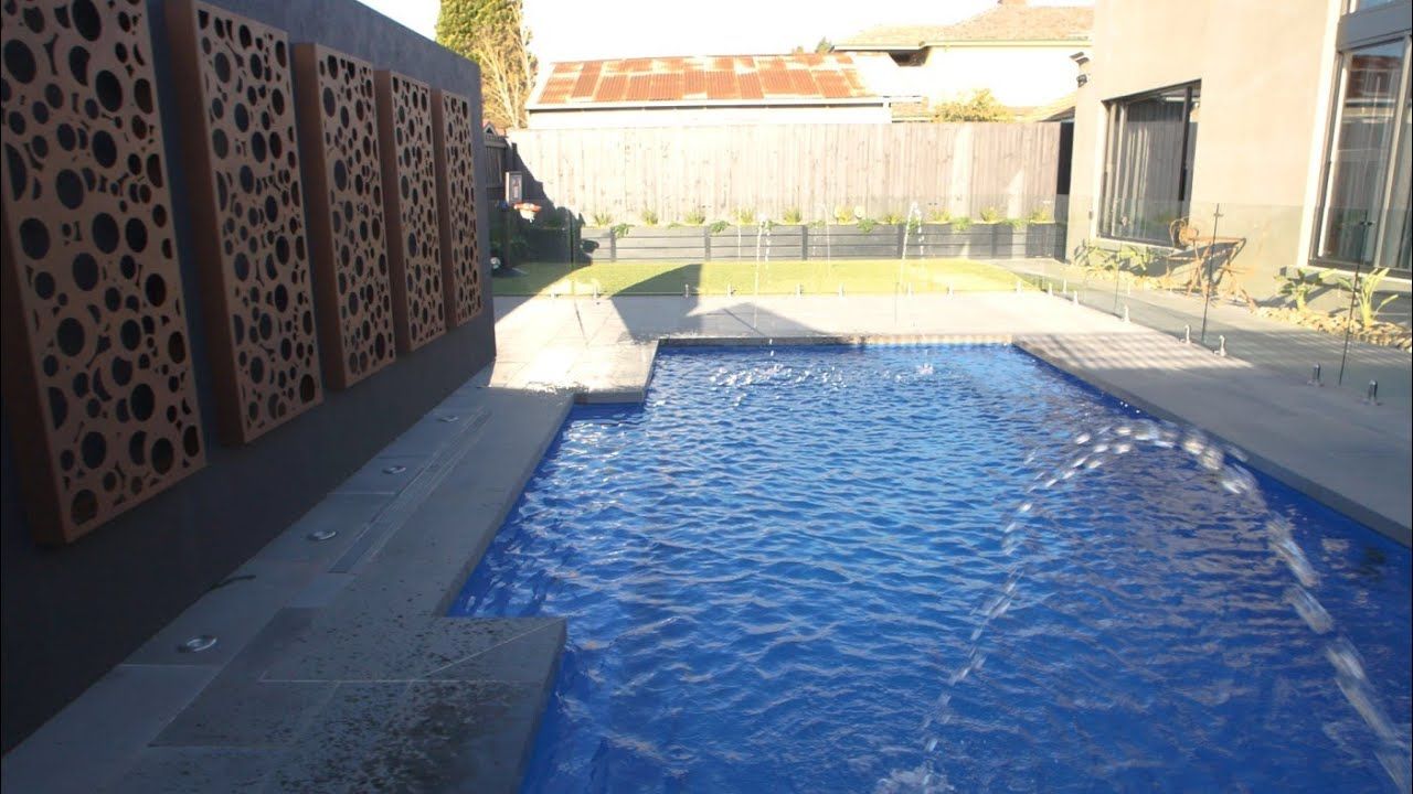 Vogue 8.2 fibreglass self-cleaning pool in Royal Blue colour, Melbourne Victoria