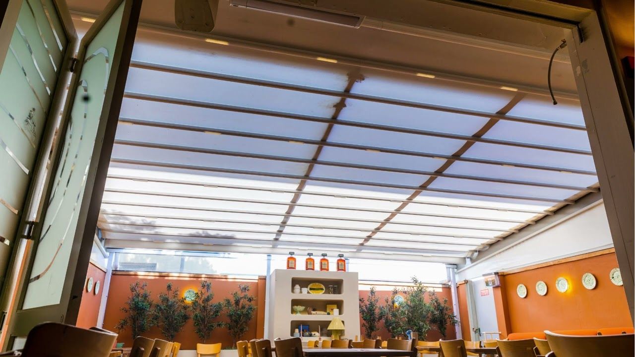 Matteo courtyard Med Evo Pro Retractable Fabric Roof