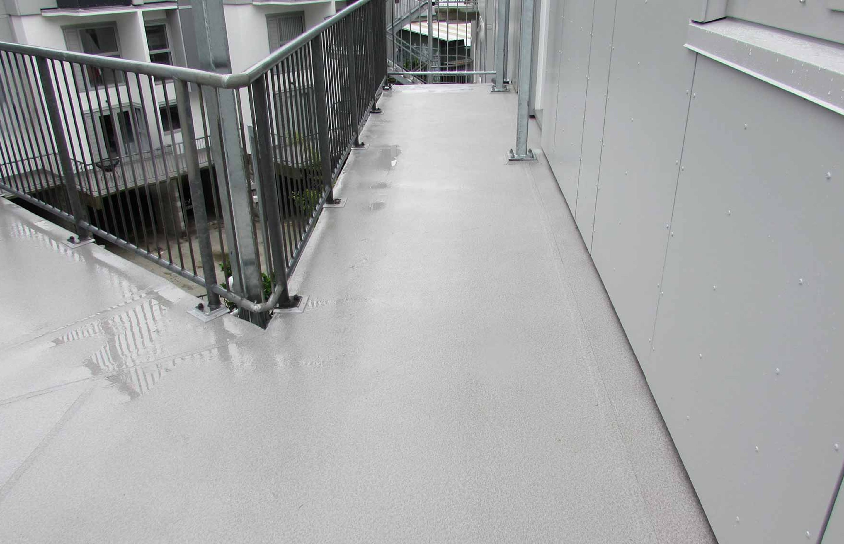 Apartment complex  gets new decks and walkway | Dec-K-ing PVC membrane.