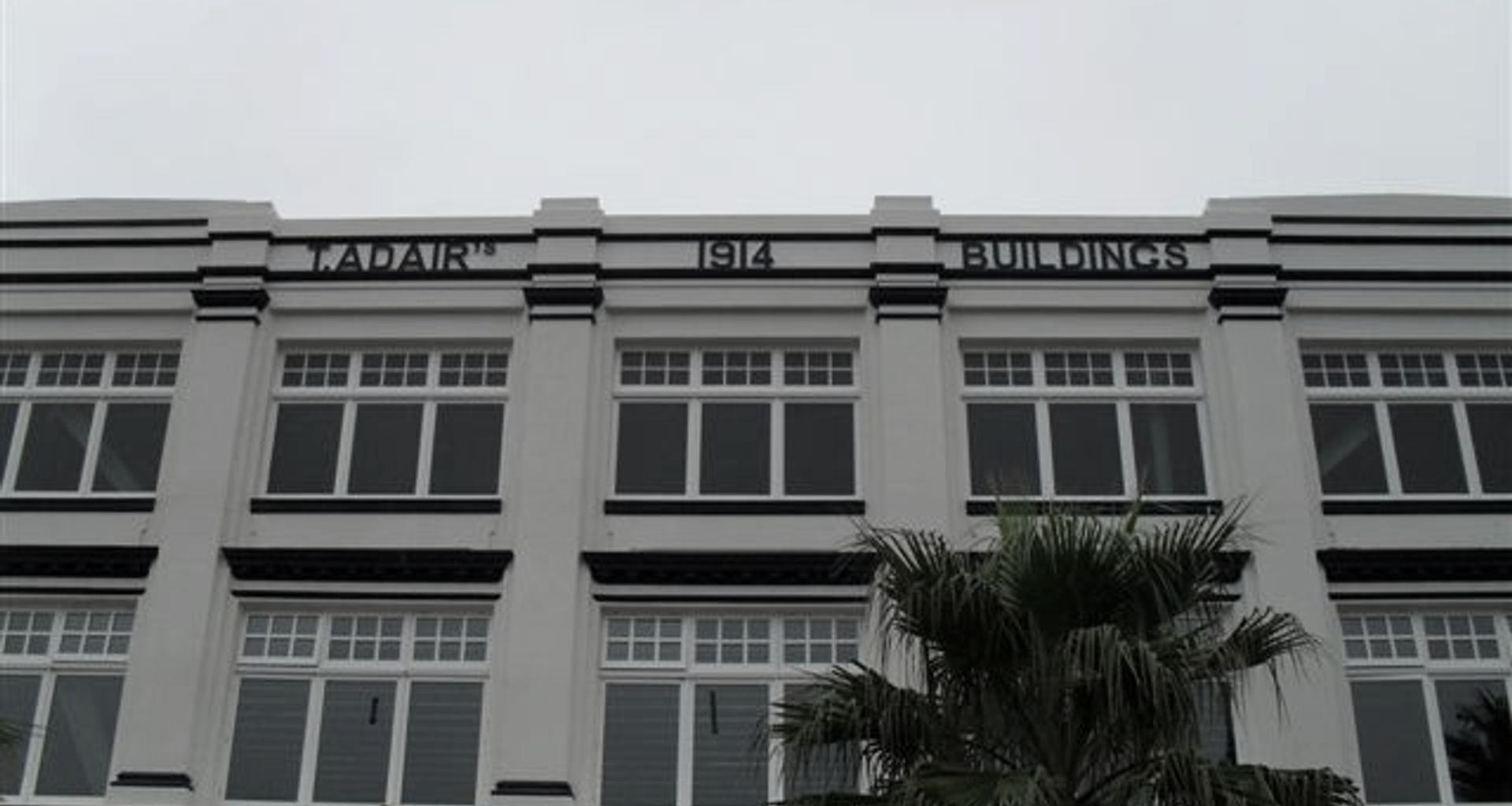 T Adair Gisborne banner