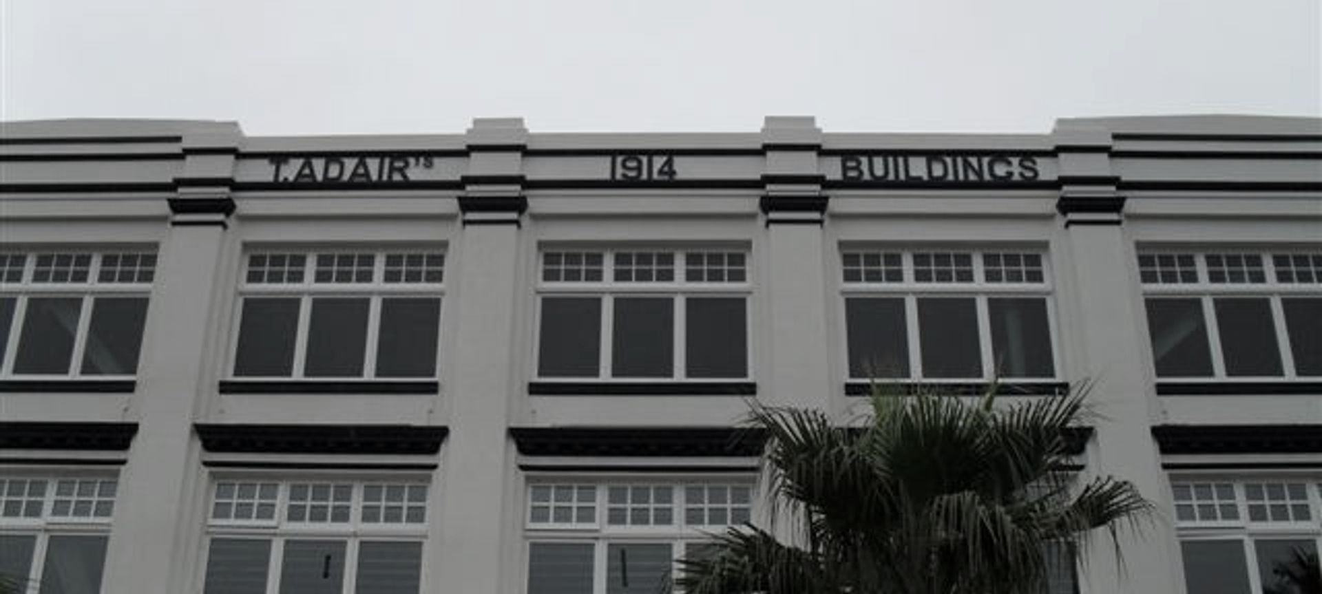 T Adair Gisborne banner