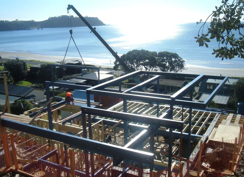 Tomik Architectural Builders