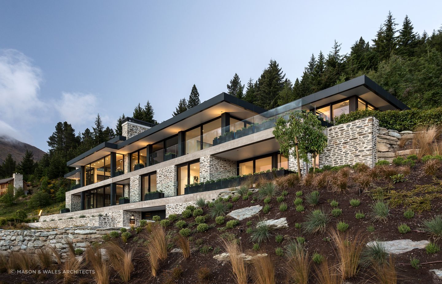 A sophisticated use of elegant concrete, stone and black steel graces the exterior of Stelvio, The Peak by Mason & Wales Architects. | Photography: Jamie Cobel