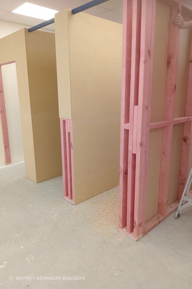 10-42-Thames-St-Oamaru-Caroline-Eve-mdf-sheeting-being-attached-to-the-framing-for-the-changing-rooms-JDBuilders.jpg