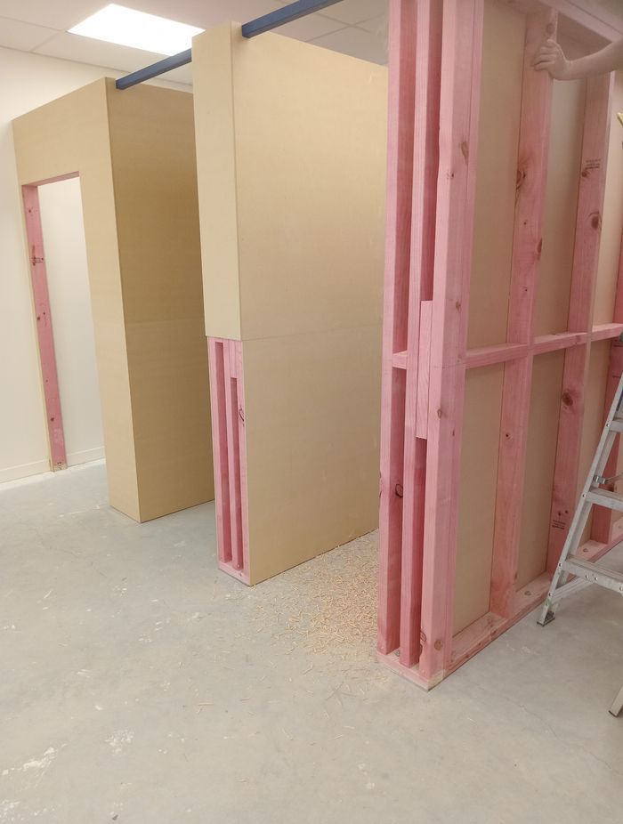 10-42-Thames-St-Oamaru-Caroline-Eve-mdf-sheeting-being-attached-to-the-framing-for-the-changing-rooms-JDBuilders.jpg