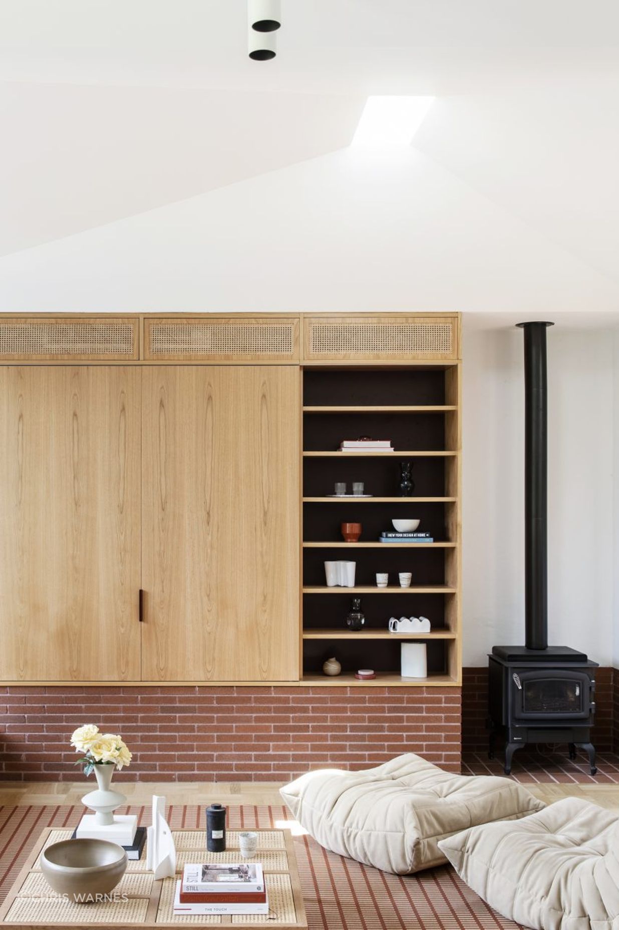 Red stack bond brick wraps around the interior.