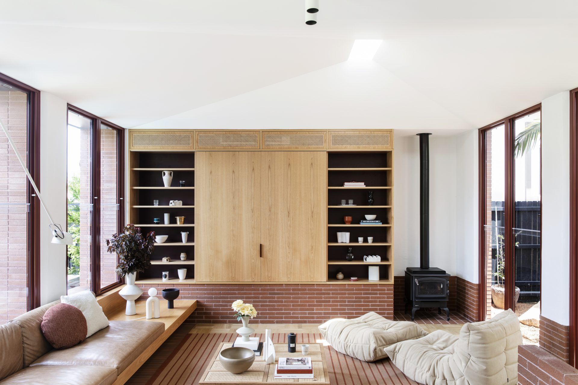 Red stack bond brick wraps around the interior.