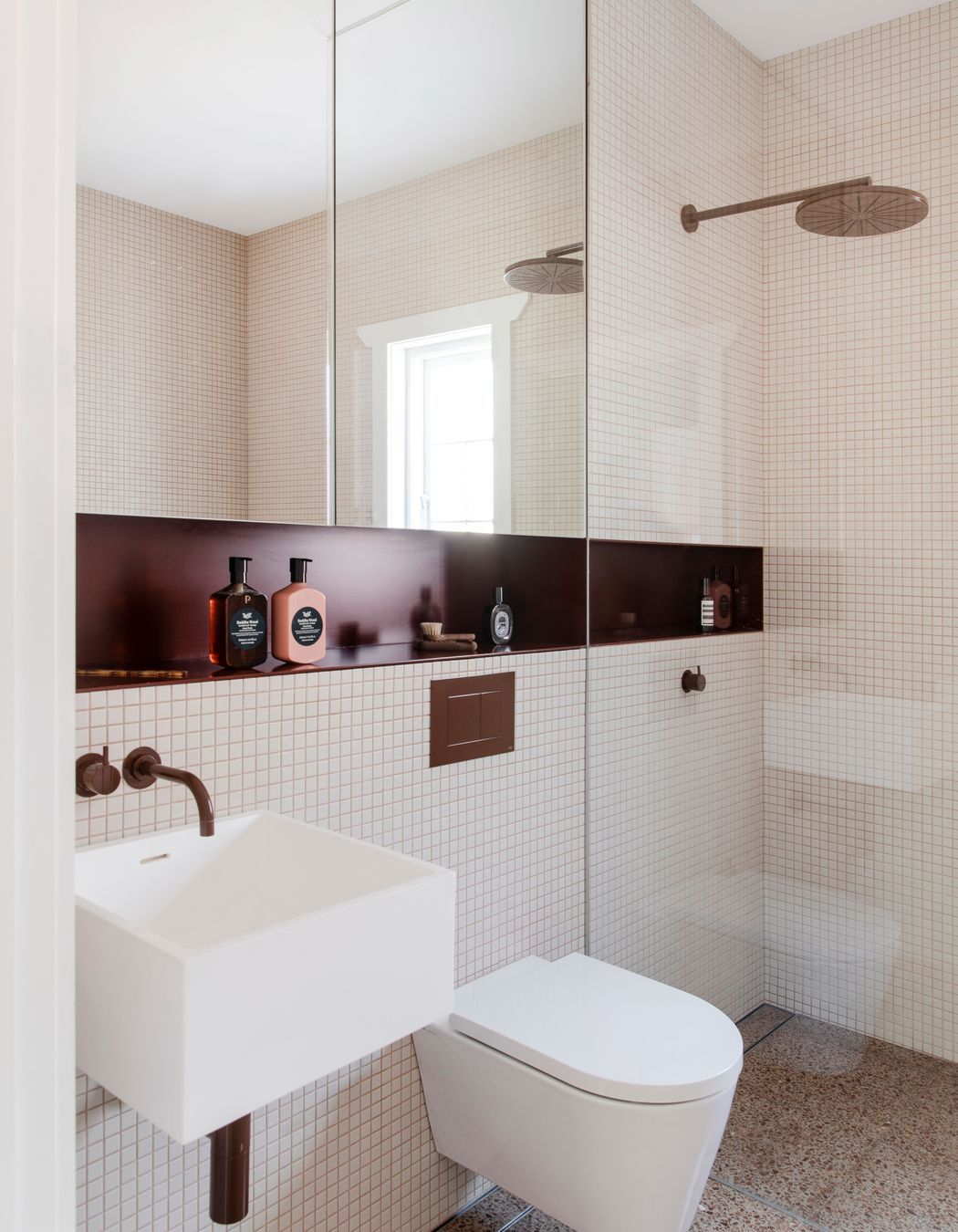 Rich tones in the bathroom.