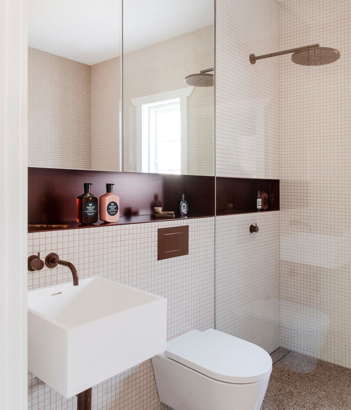 Rich tones in the bathroom.