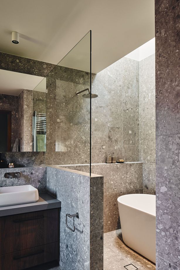 The design approach interplays a variety of eclectic materials and interesting elements.
