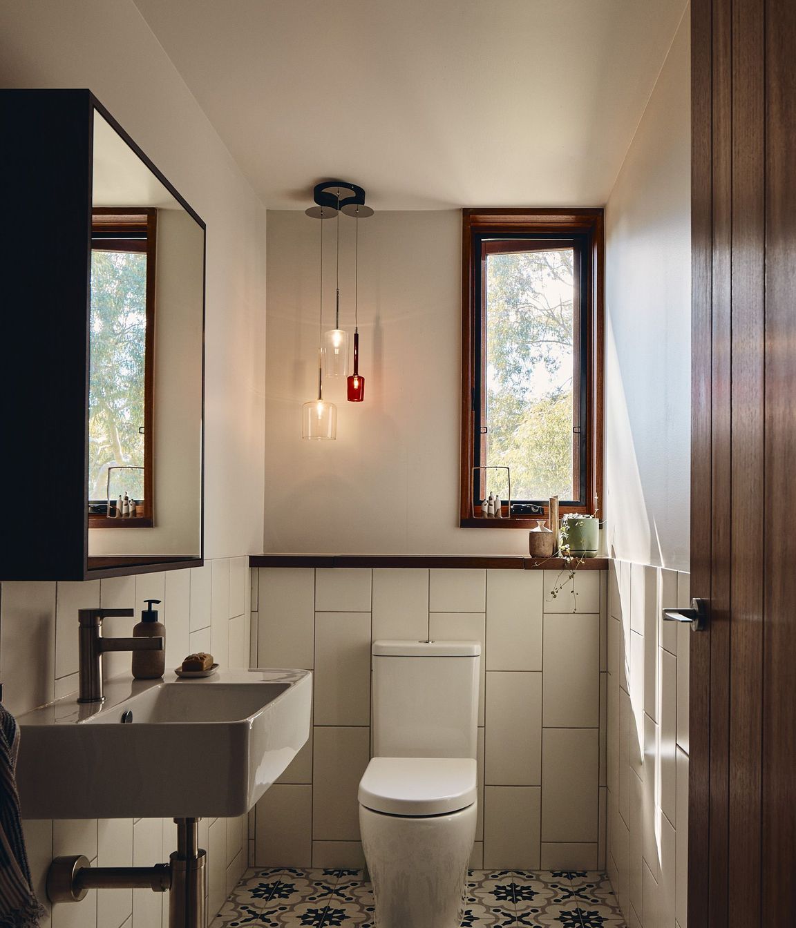 The timber, aside from its classic aesthetic appeal, brings warmth, tactility and human scale to the home.
