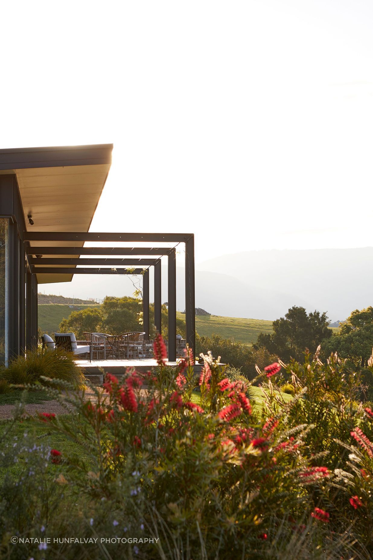 Sunlight shines on the large north-facing porch.