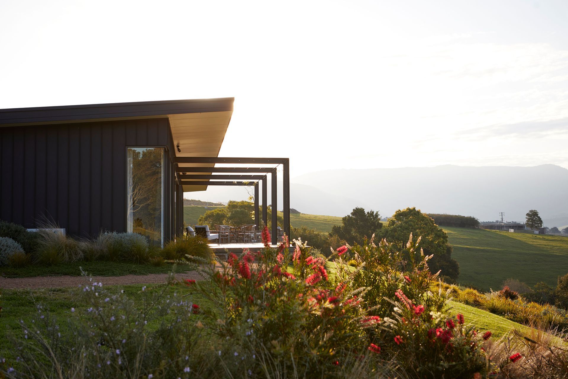 Sunlight shines on the large north-facing porch.