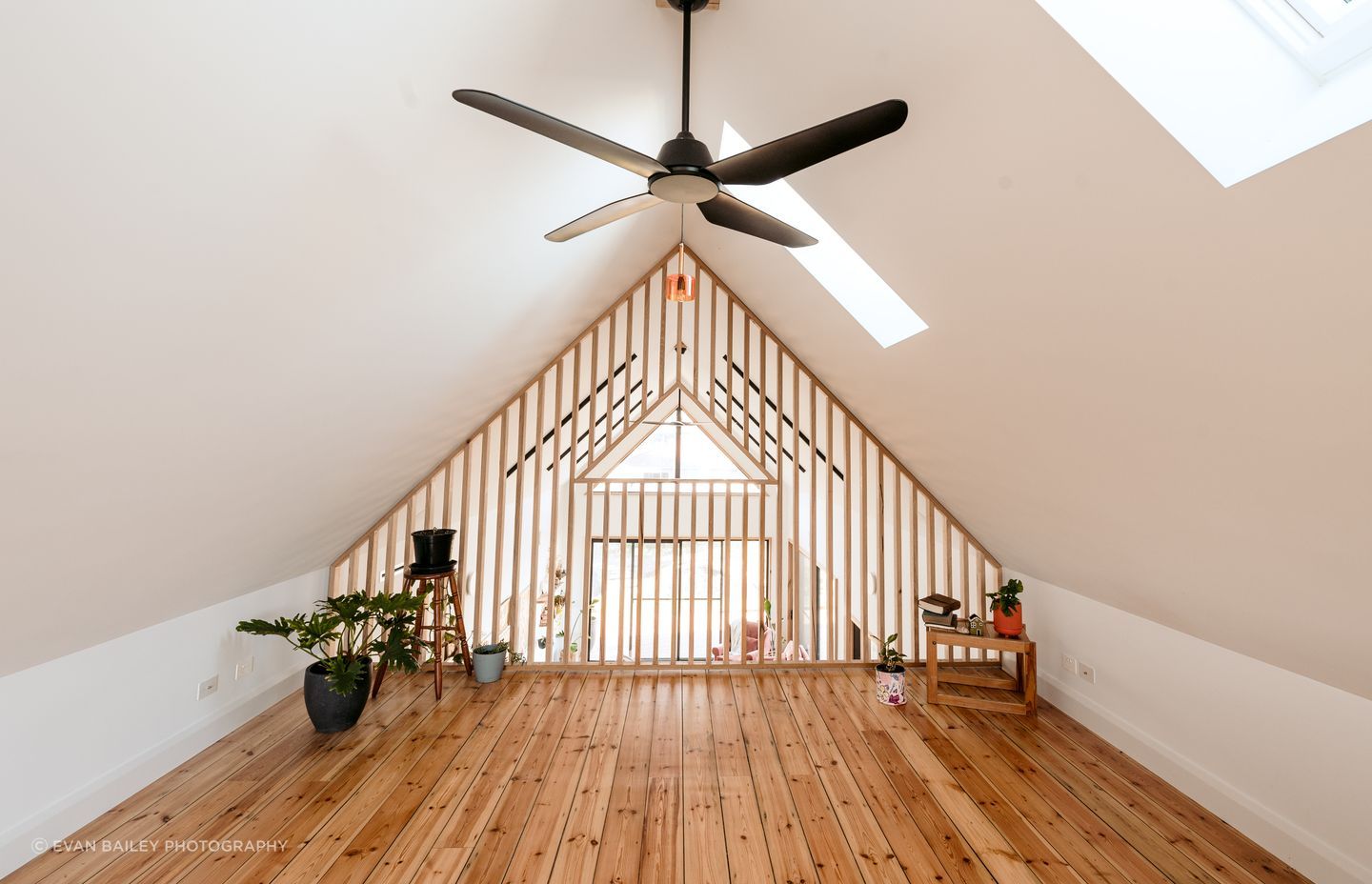 The loft flooring is recycled floorboards from the original asbestos shack on the property.