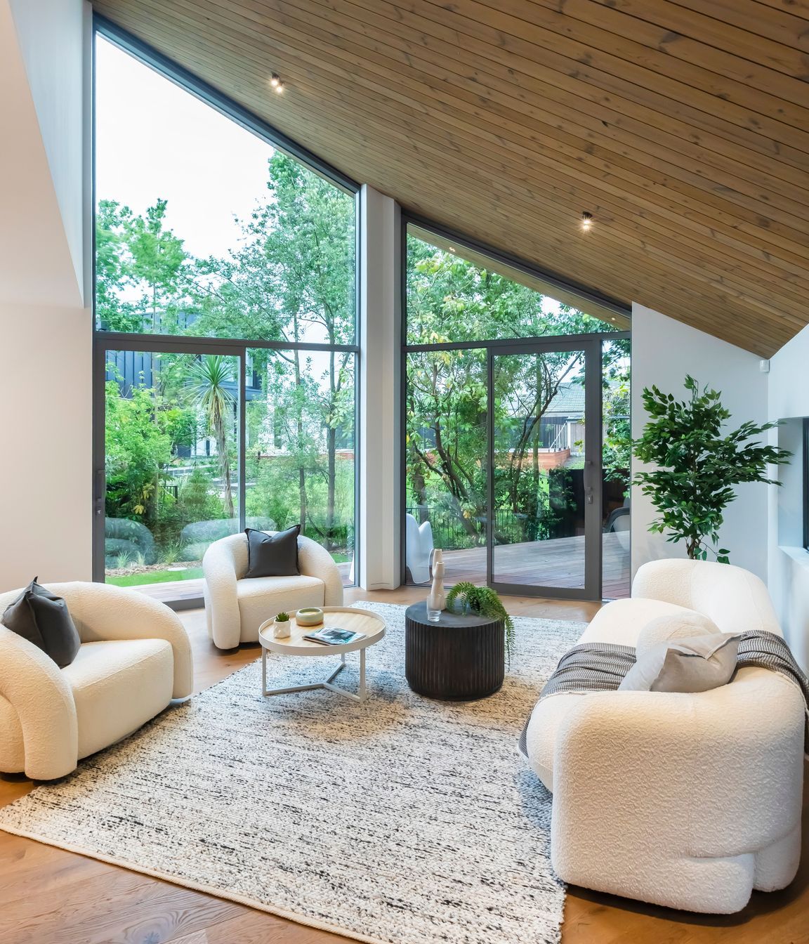 A minimalist palette draws the eye to the stunning ceilings.