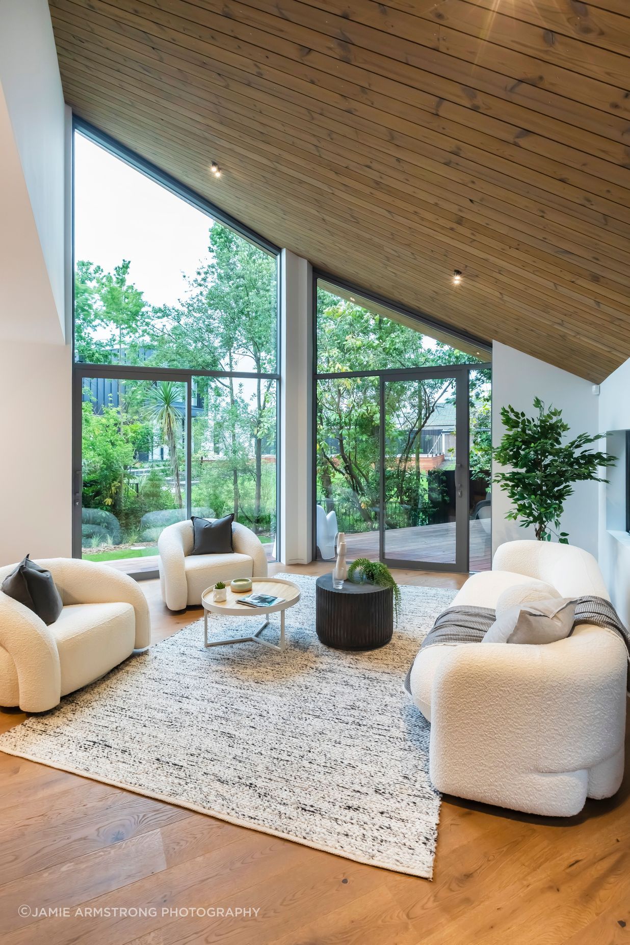 A minimalist palette draws the eye to the stunning ceilings.