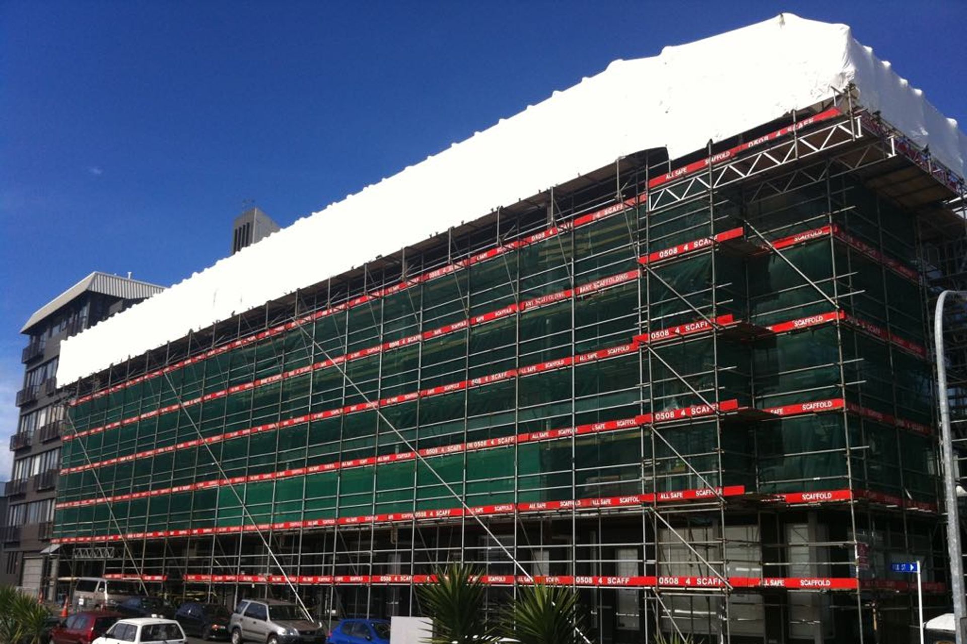 One of the advantages of shrink wrapping over traditional tarpaulins includes allowing contractors to continue working unimpeded on a build, whatever the weather.
