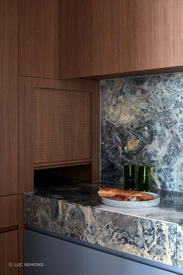 The built-in cabinetry work seamlessly in the kitchen and living room.