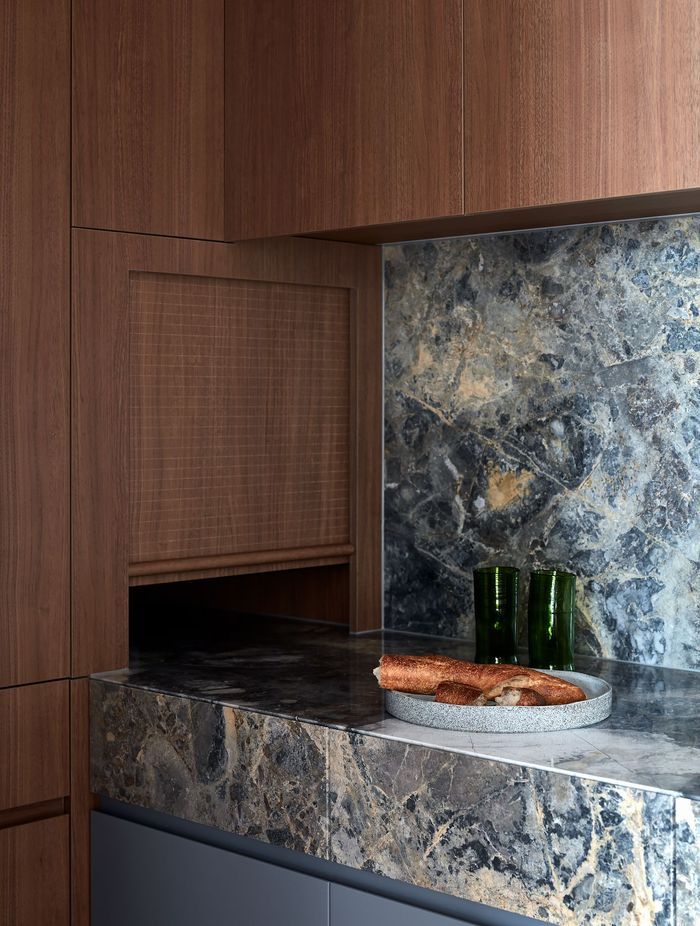 The built-in cabinetry work seamlessly in the kitchen and living room.